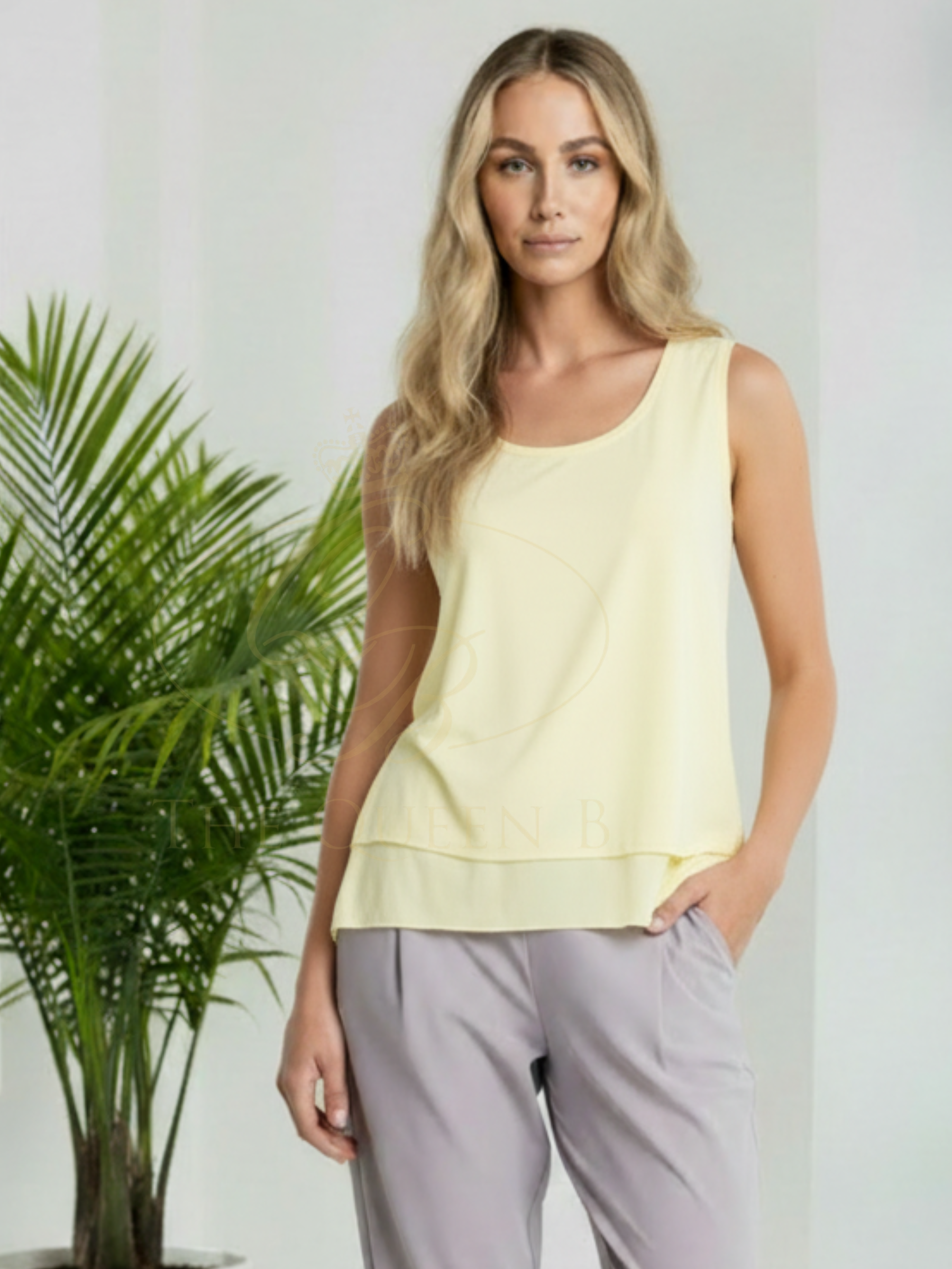 Naya NAS26 115 Raw Hem & Vented Back Cami Top featuring soft cotton stretch fabric, sleeveless design, raw hem finish and vented back detail.