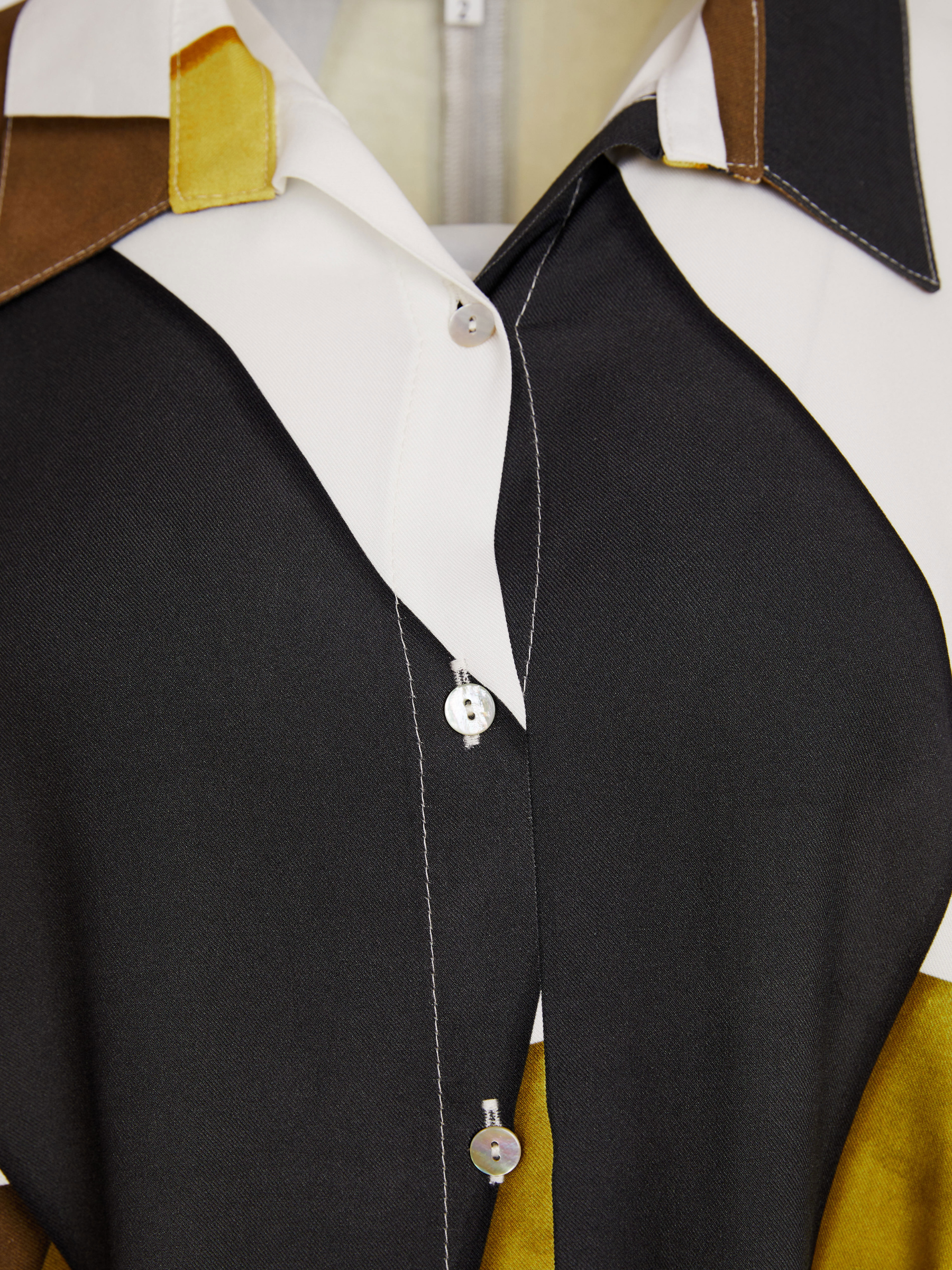 Naya NAS26 152 Multi Colour Graphic Print Top featuring abstract multi-colour design, soft collar, button-through front and relaxed silhouette.