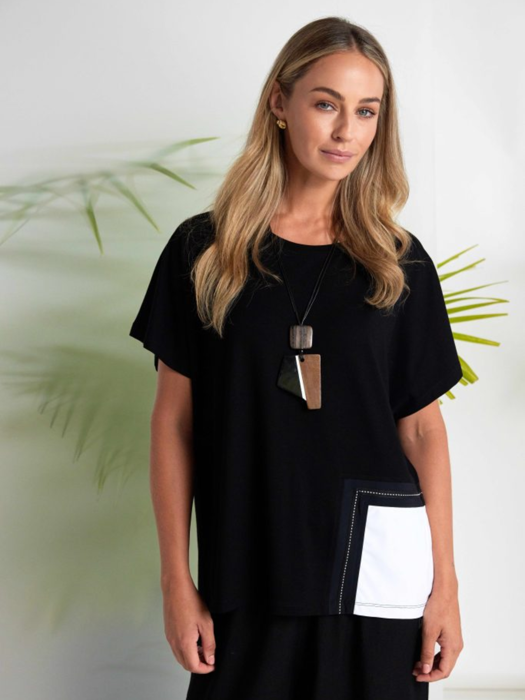 Naya NAS26 188 Contrast Pocket Round Neck Top in soft stretch jersey with relaxed fit, contrast pocket detail and contemporary everyday design.