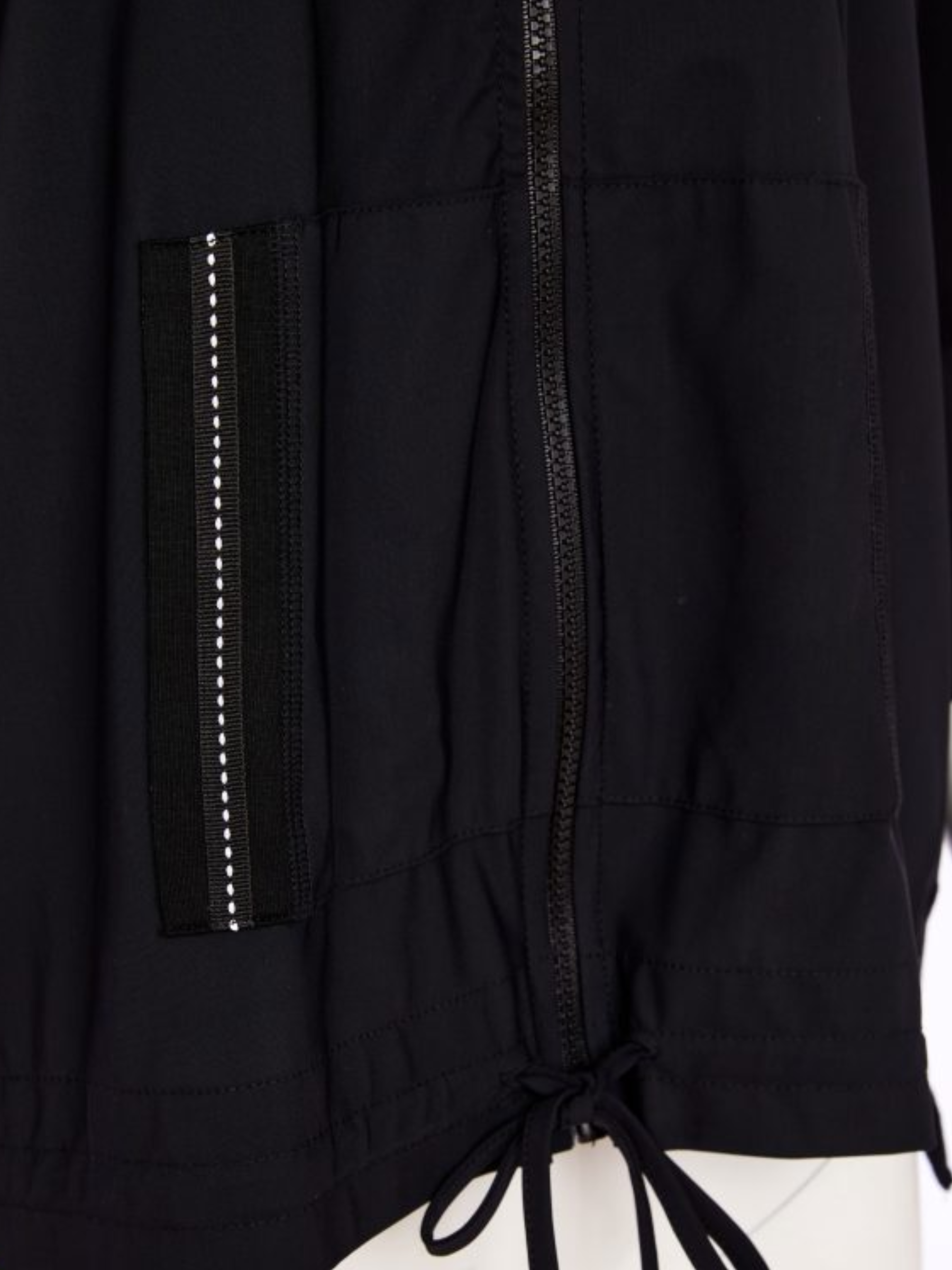 Naya NAS26 196 drawstring hem zip jacket in soft stretch fabric with relaxed fit and modern everyday design.