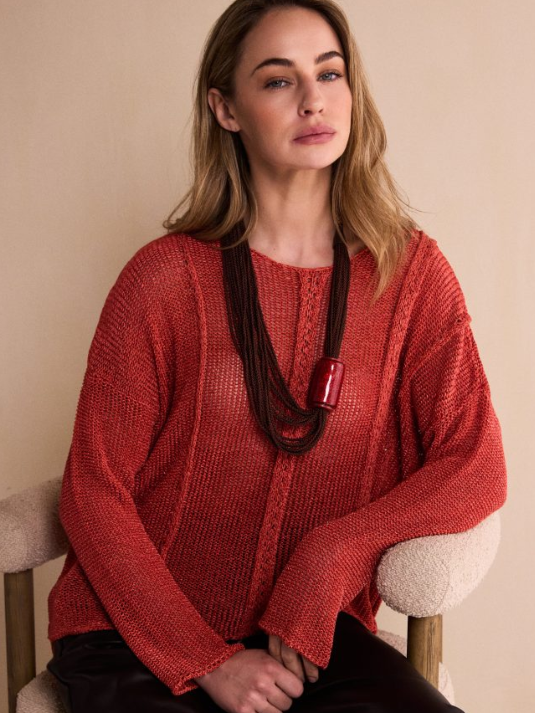 Naya NAW26 120 Round Neck Knit with long sleeves, textured front detail and relaxed hip-length fit