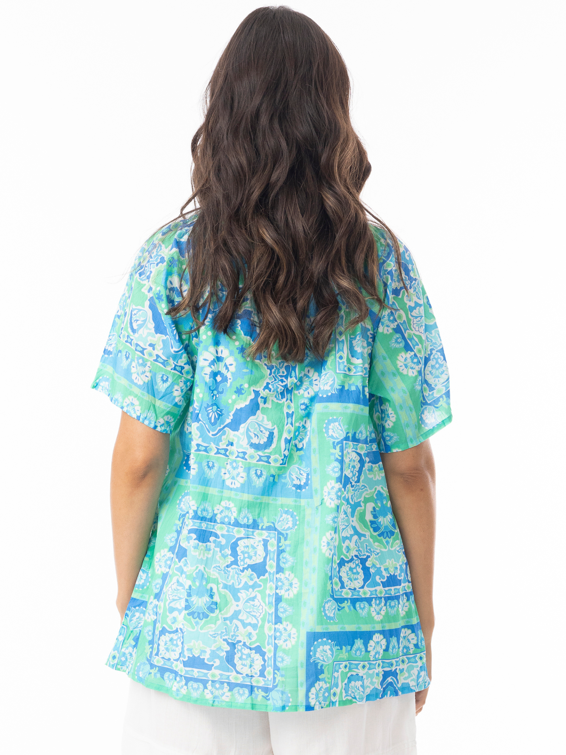 Orientique 12267 Montevideo Top relaxed-fit printed blouse with V-neckline, tassel tie detail and short flutter sleeves.