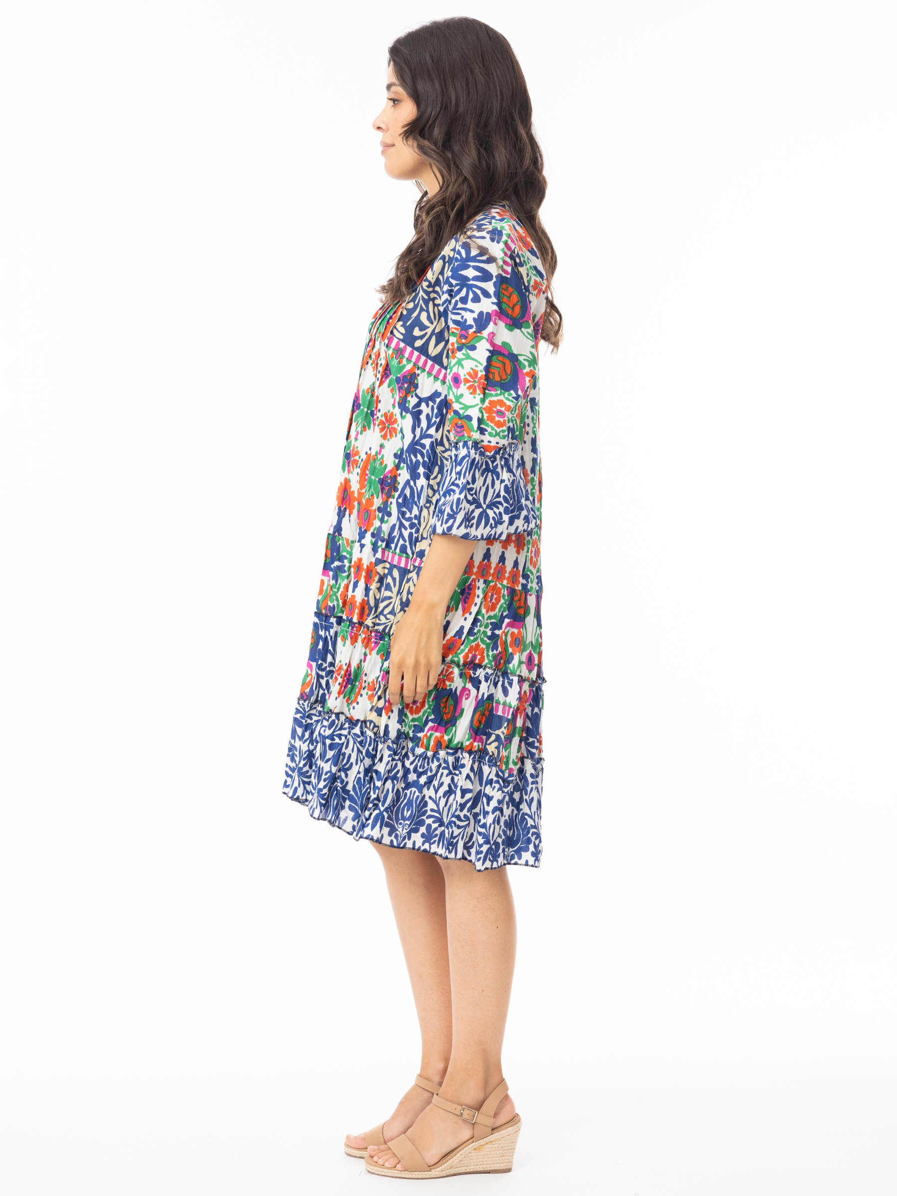 Orientique 30207 Buzios Dress printed knee-length A-line dress with V-neckline, tiered skirt and three-quarter sleeves.
Dress Style: A-line