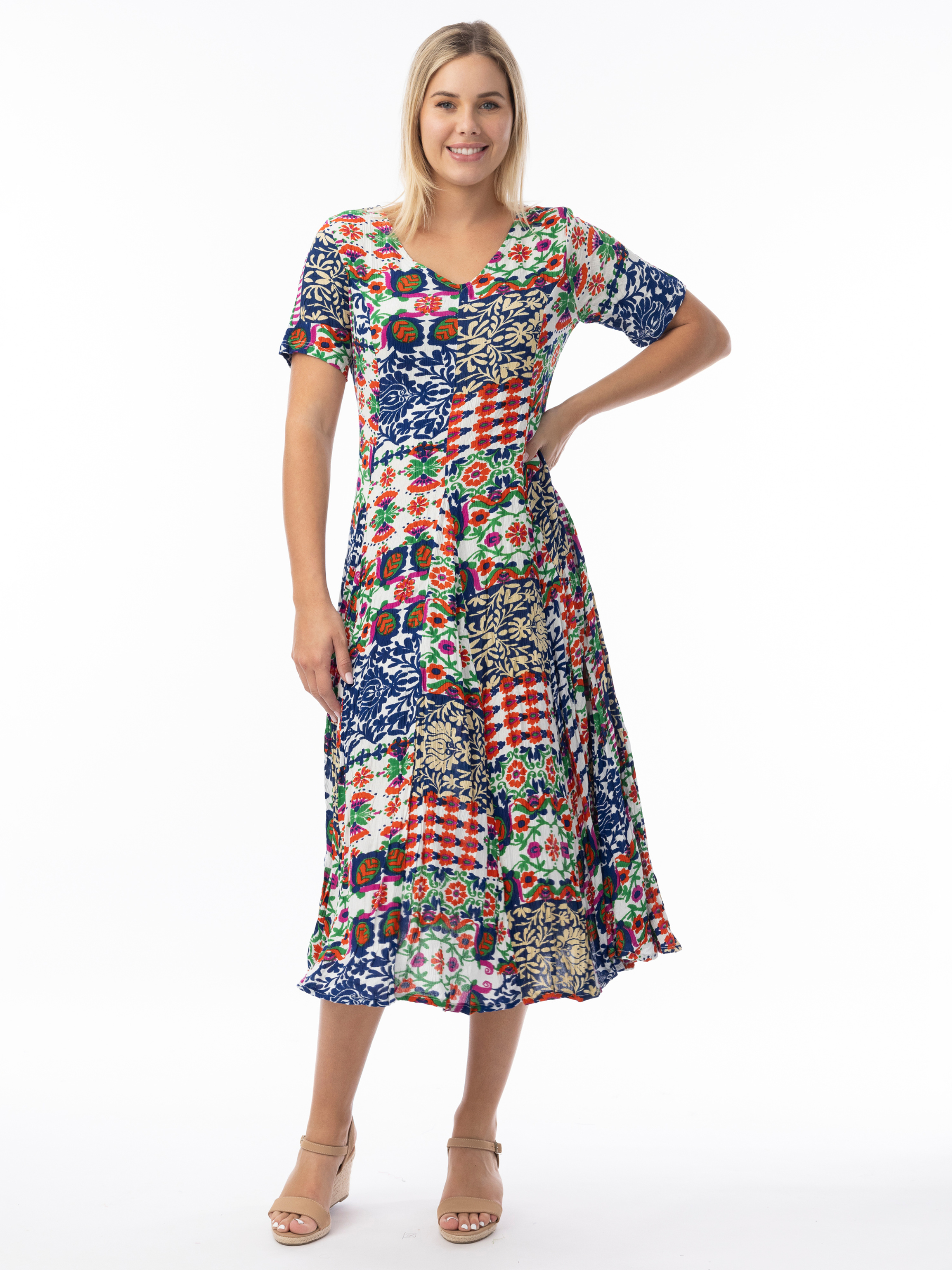 Orientique 30210 Buzios Godet Dress printed midi A-line dress with V-neckline, short sleeves and flared godet skirt.