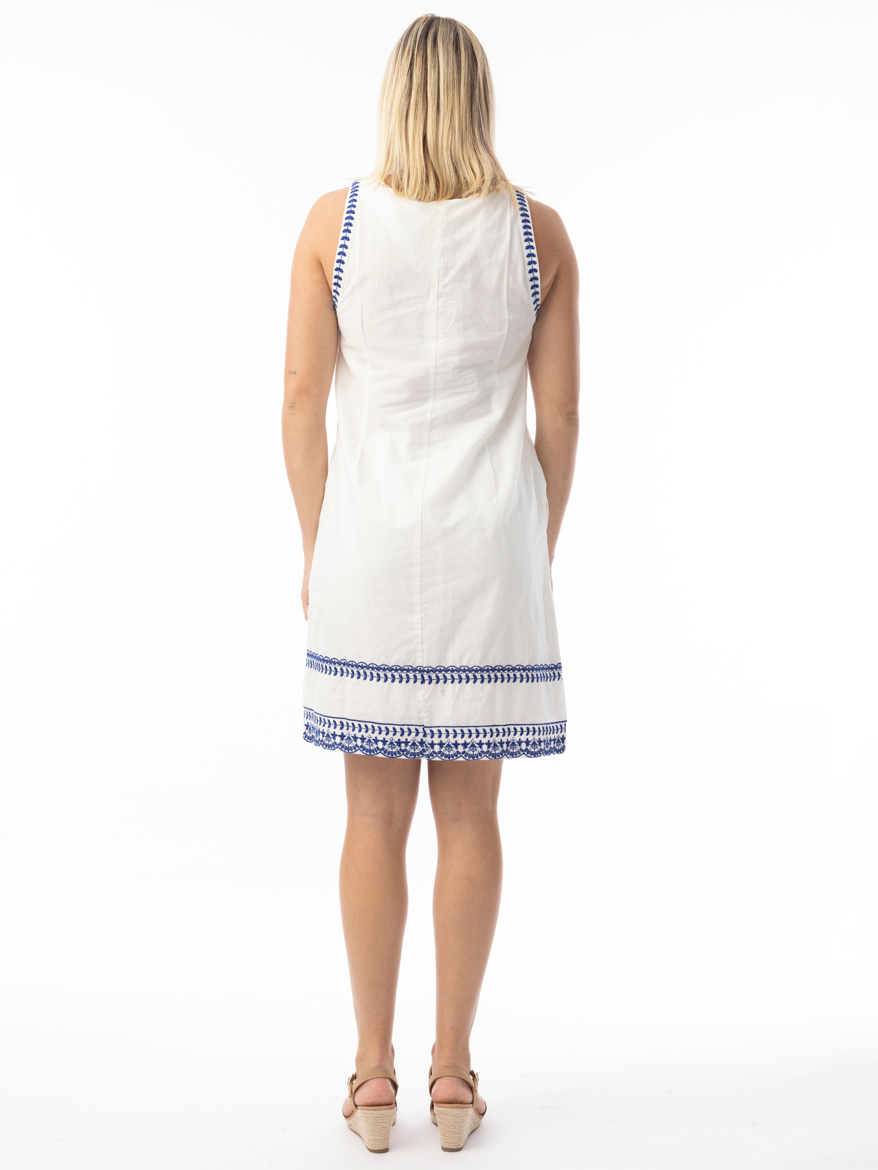 Orientique 30221 Embroidered Essentials Shift Dress sleeveless shift dress with V-notch neckline and embroidered hem detail.