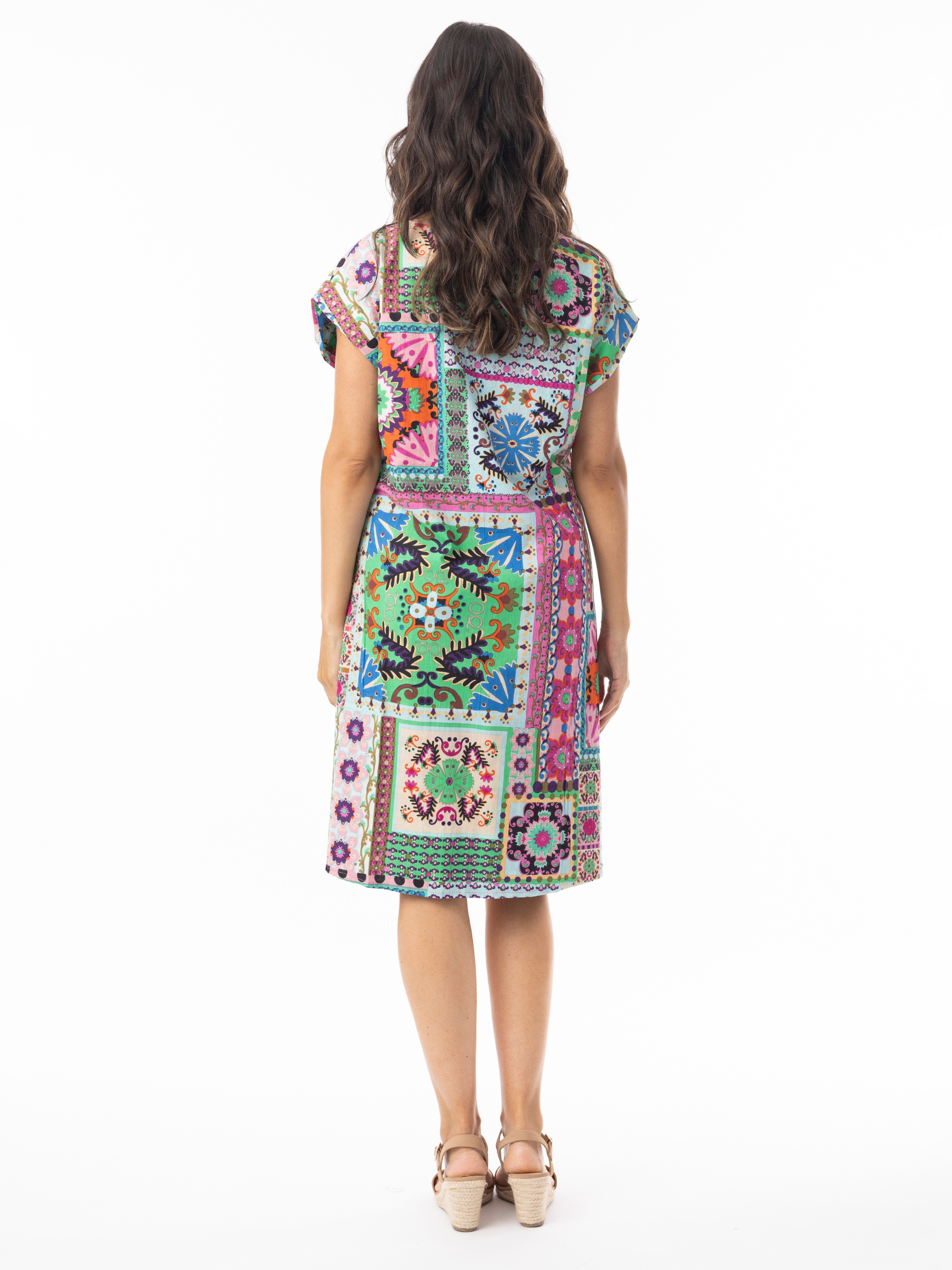 Orientique 61736 Sao Bento Dress, reversible knee-length shift dress with short sleeves and a round neckline, shown in two different prints.