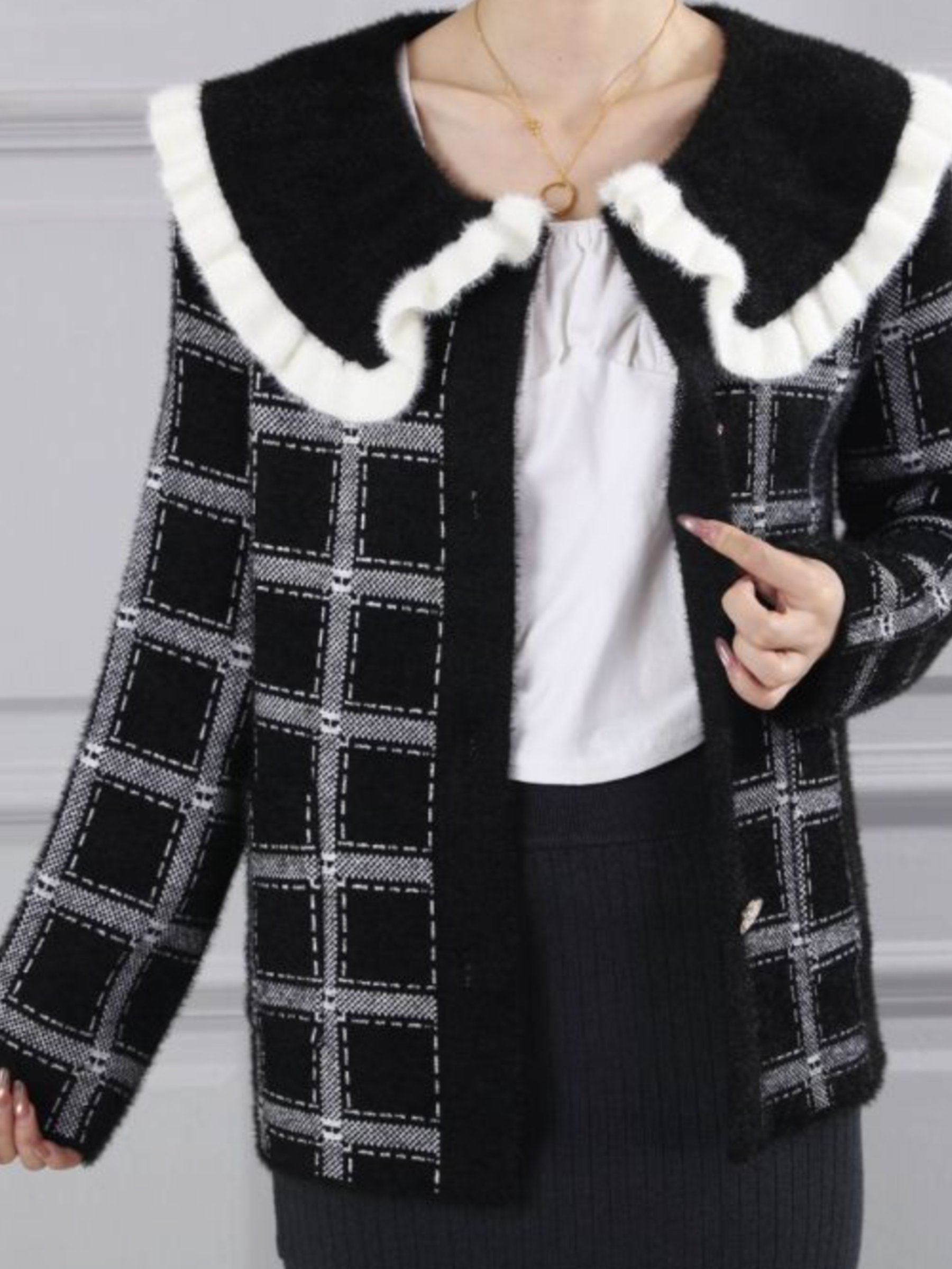 PCHA CA216 Ruffle Collar Plaid Cardigan with plaid pattern, oversized ruffle-trim collar and button-front fastening.