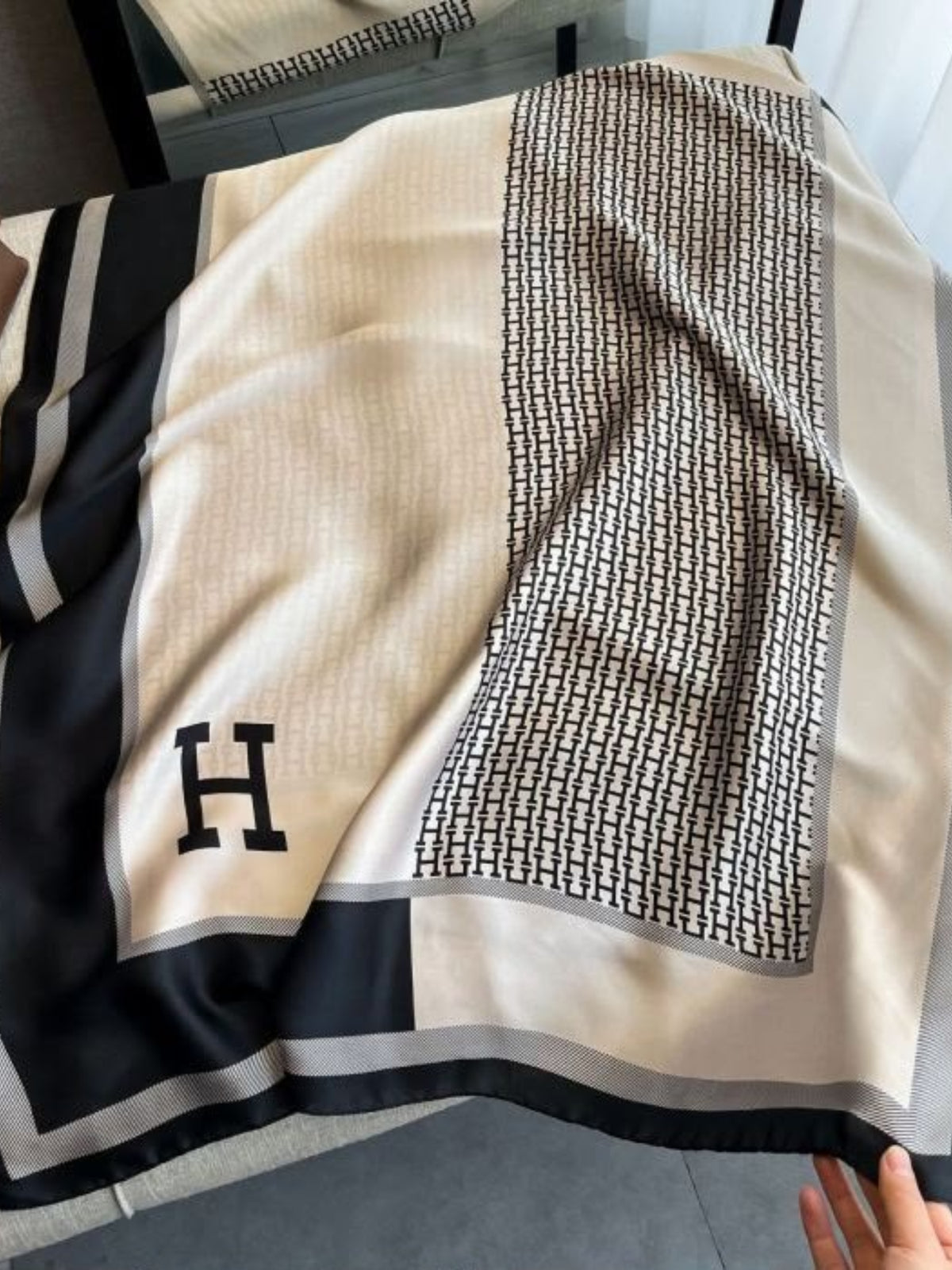 PCHA TT300 Letter H Scarf with repeating letter motif, oversized initial detail and structured border design.