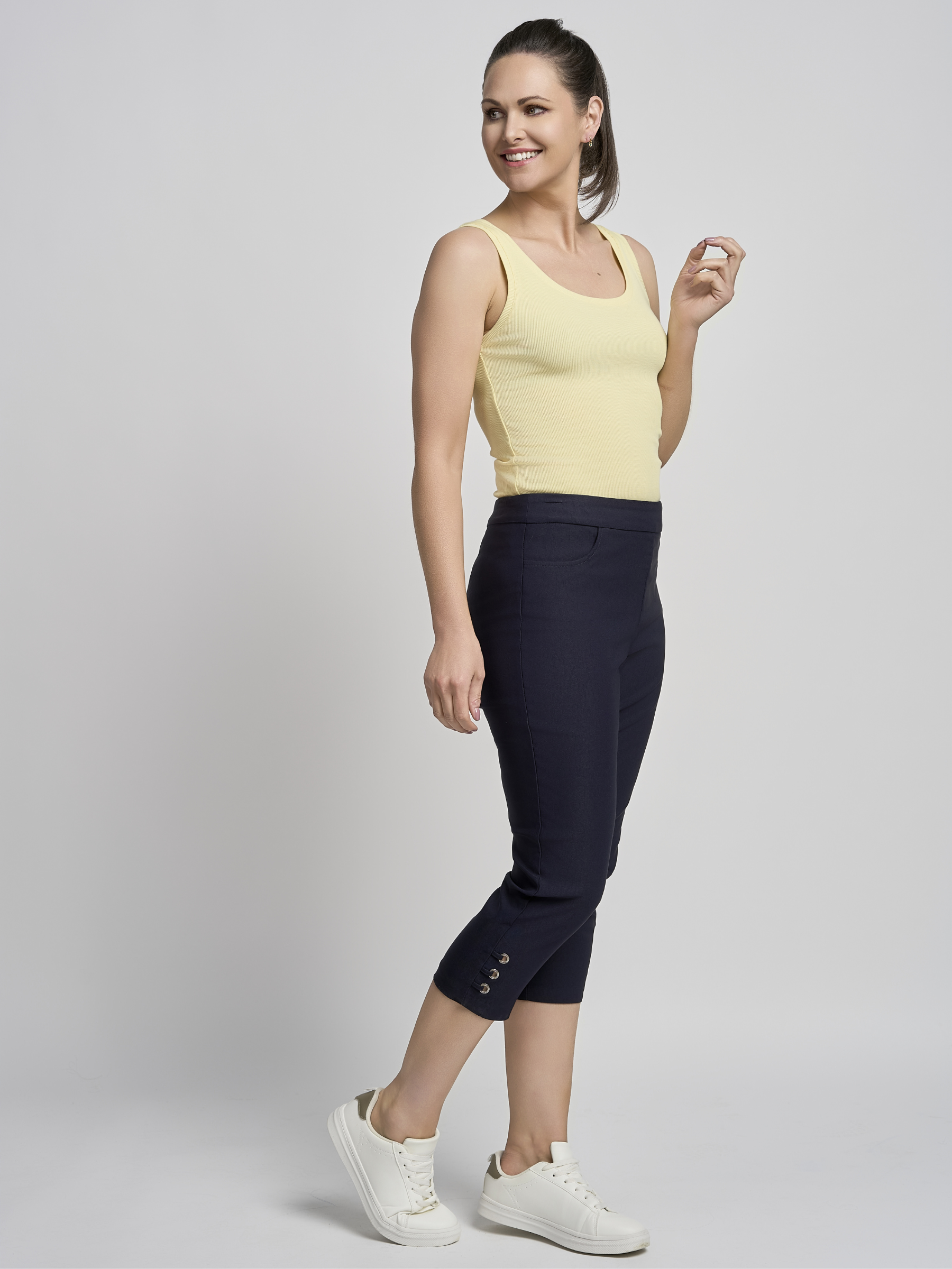 PINNS 408C navy women’s sculpting bengaline crop trousers with hidden tummy control and diamond eyelet hem.