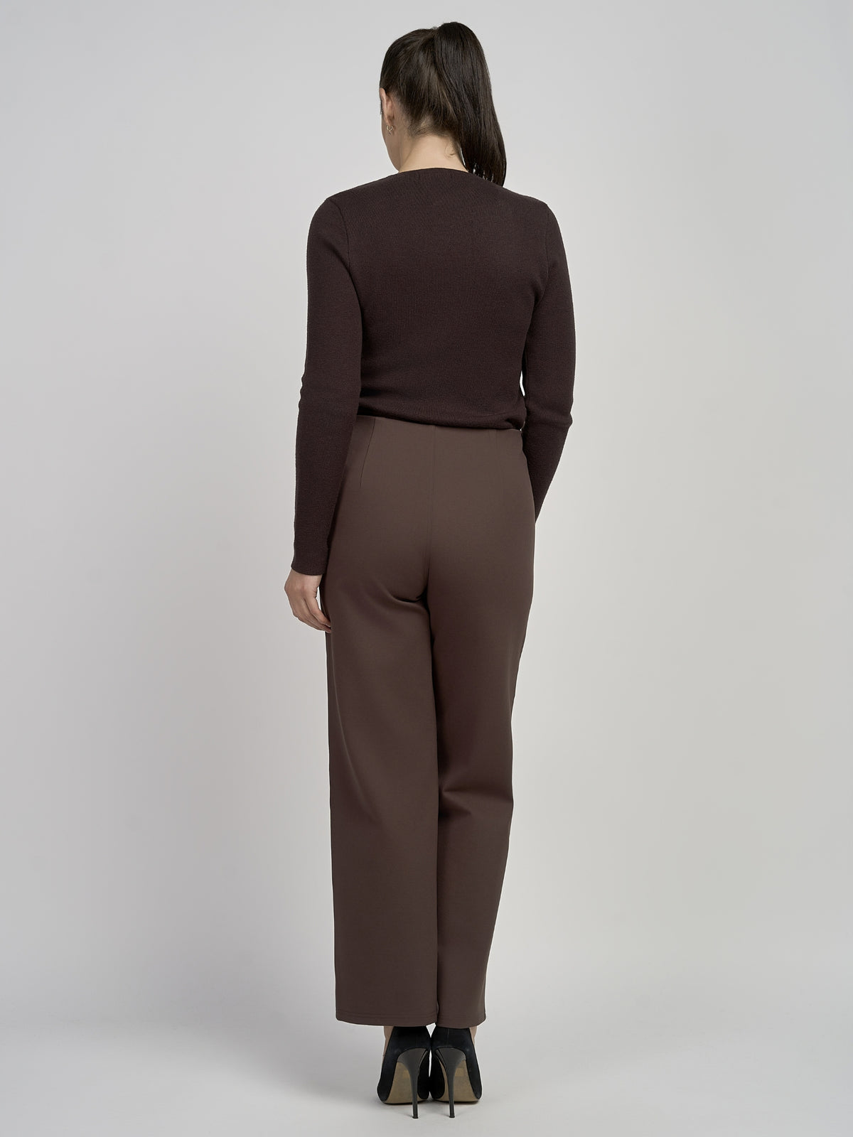PINNS 610T Wide Leg Trousers with high-rise waist, decorative front buttons and full-length wide leg silhouette.