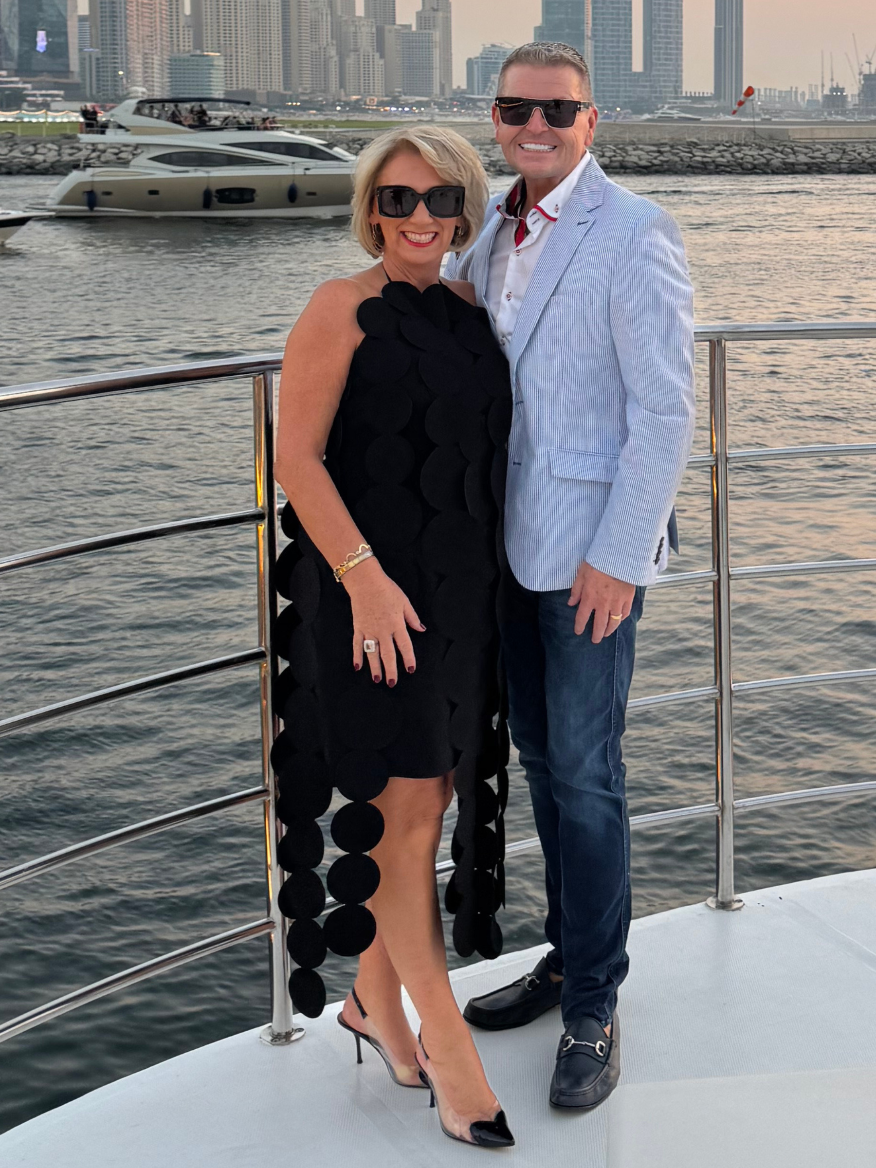 Black circular appliqué yacht dress as seen on Jodie at her birthday celebrations, also available in fuchsia.