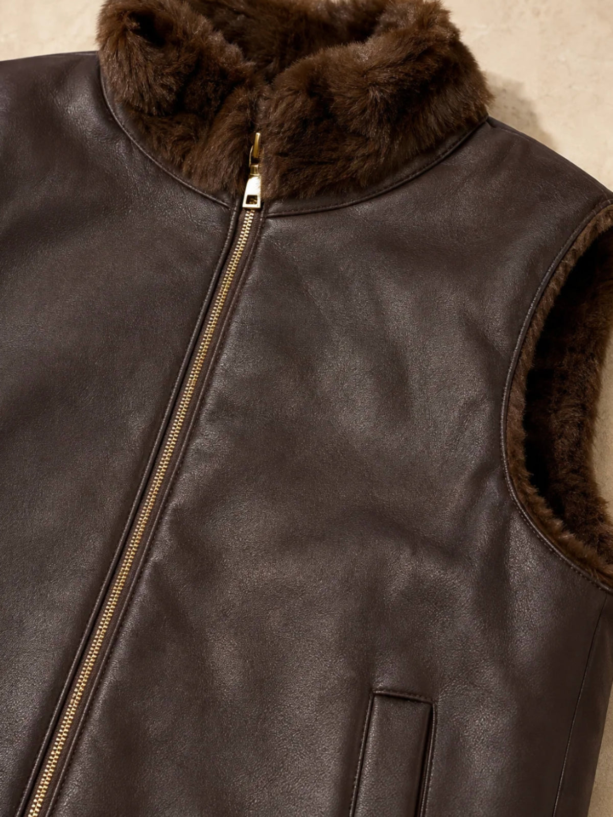 QBAW26 CW Elizabeth Reversible Long Gilet with smooth outer finish, soft textured reverse, high neckline and zip fastening.