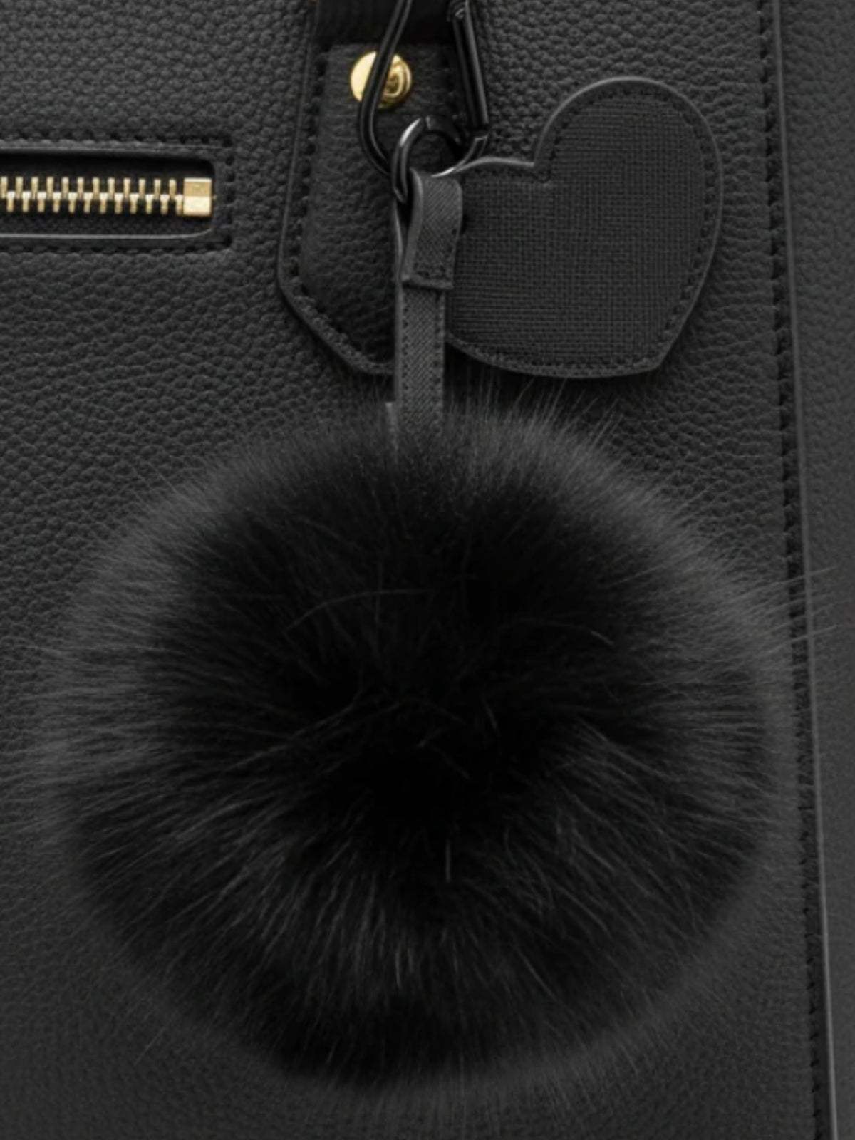 QBAW26 CW Emma Pom Pom Key Chain with soft fluffy pom pom and loop attachment.