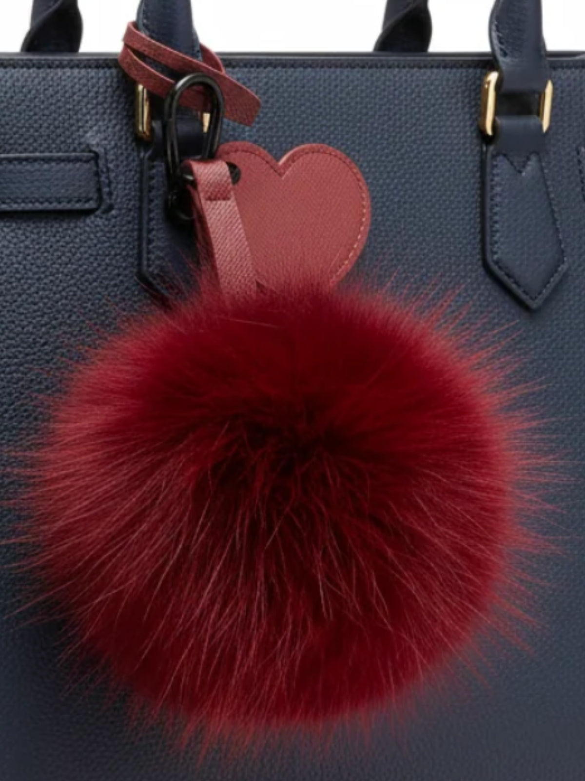 QBAW26 CW Emma Pom Pom Key Chain with soft fluffy pom pom and loop attachment.