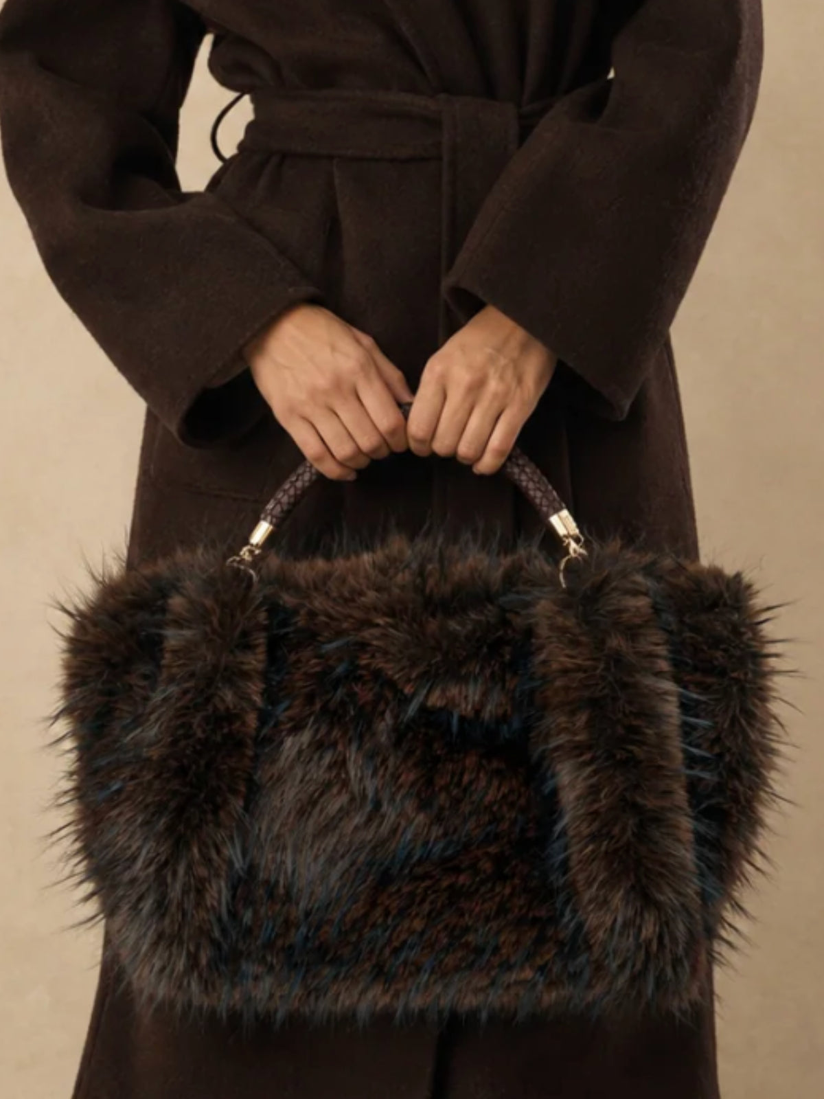 QBAW26 CW Grace Faux Fur Tote Bag with plush textured finish, structured shape, braided top handle and decorative hardware.