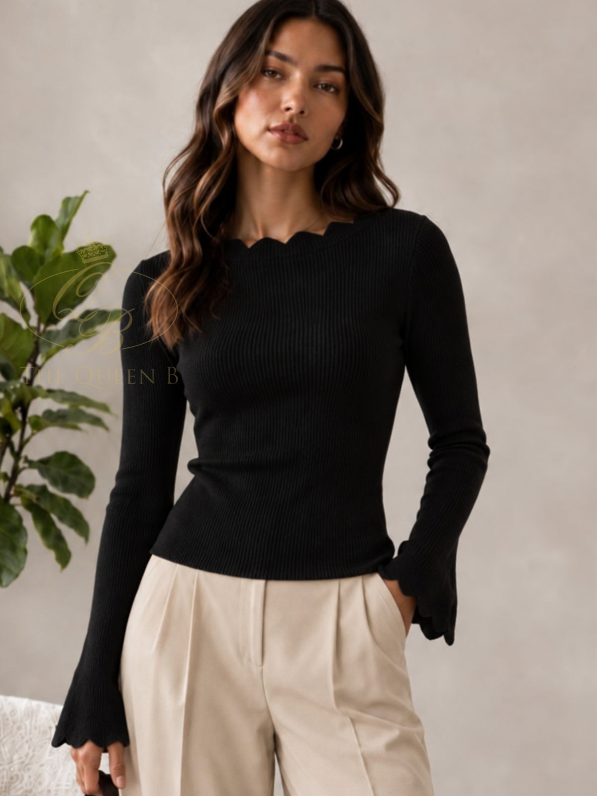 QBAW26 LX Alice Knitwear with scalloped neckline, fine ribbed texture, long sleeves and flared scallop cuffs.