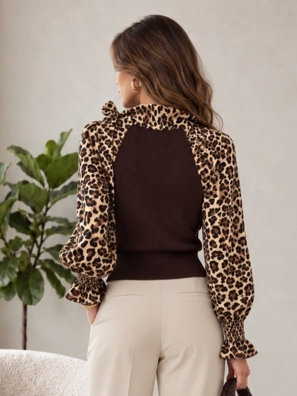 QBAW26 LX Amy Bow Detailed Leopard Print Top with bow neckline, balloon sleeves, frill cuffs and contrast ribbed back.