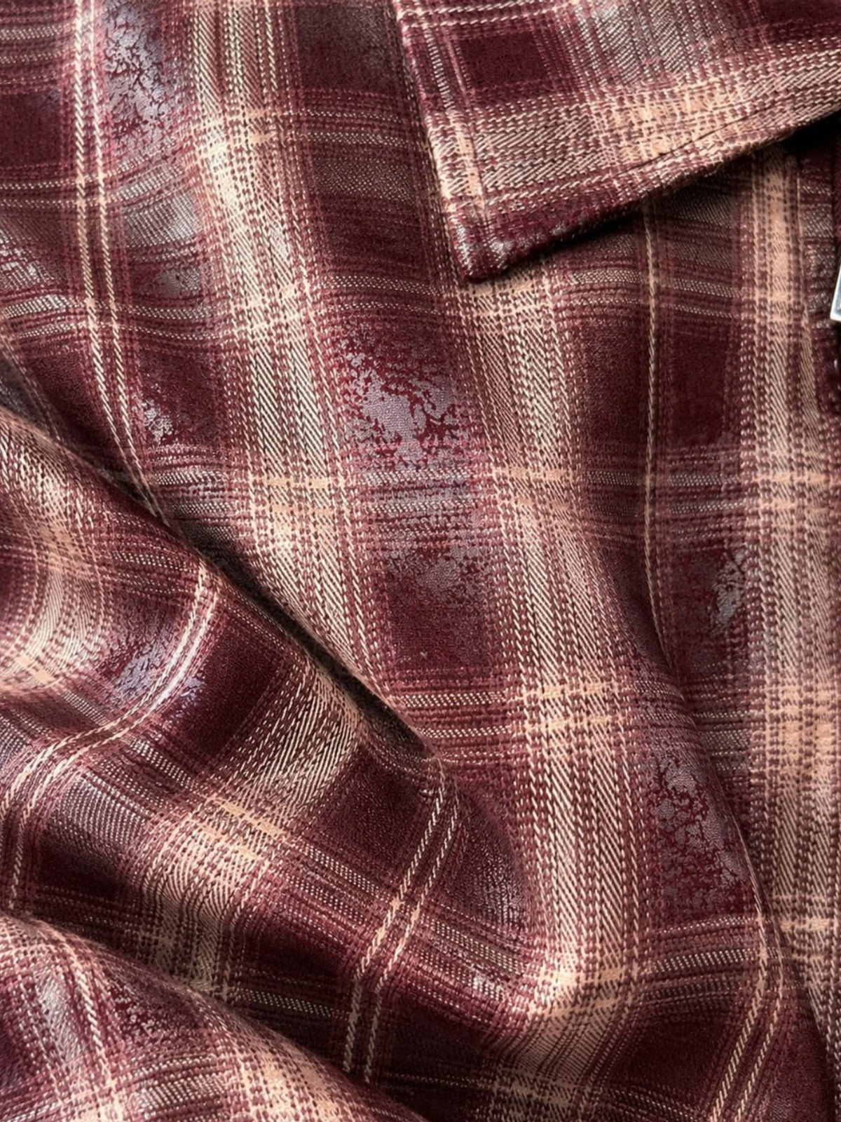 QBAW26 LX Zoey Checkered Jacket with collared neckline, zip-through front, long voluminous sleeves and check pattern.
