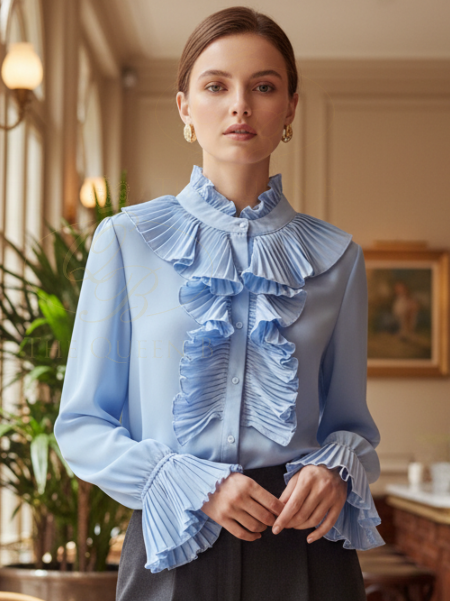 QBSS26 BC Frilly Blouse featuring a high neckline, pleated ruffle front and frilled cuffs.