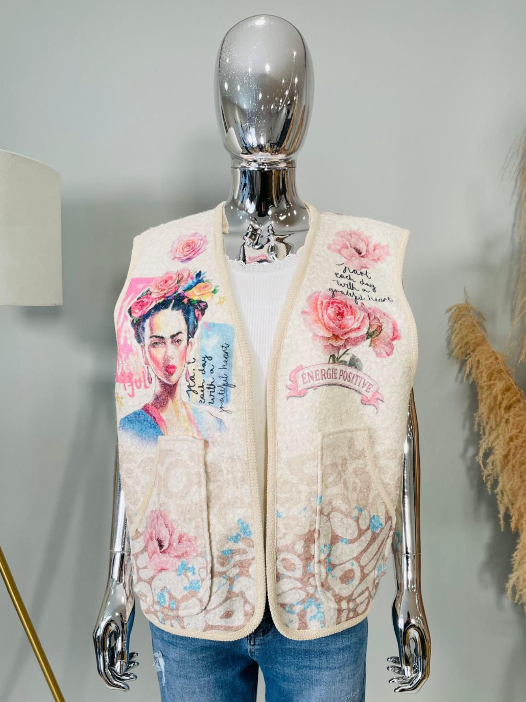 QBSS26 BC Isla Frieda Gilet featuring sleeveless open-front design with Frida-inspired artwork and floral print detailing.