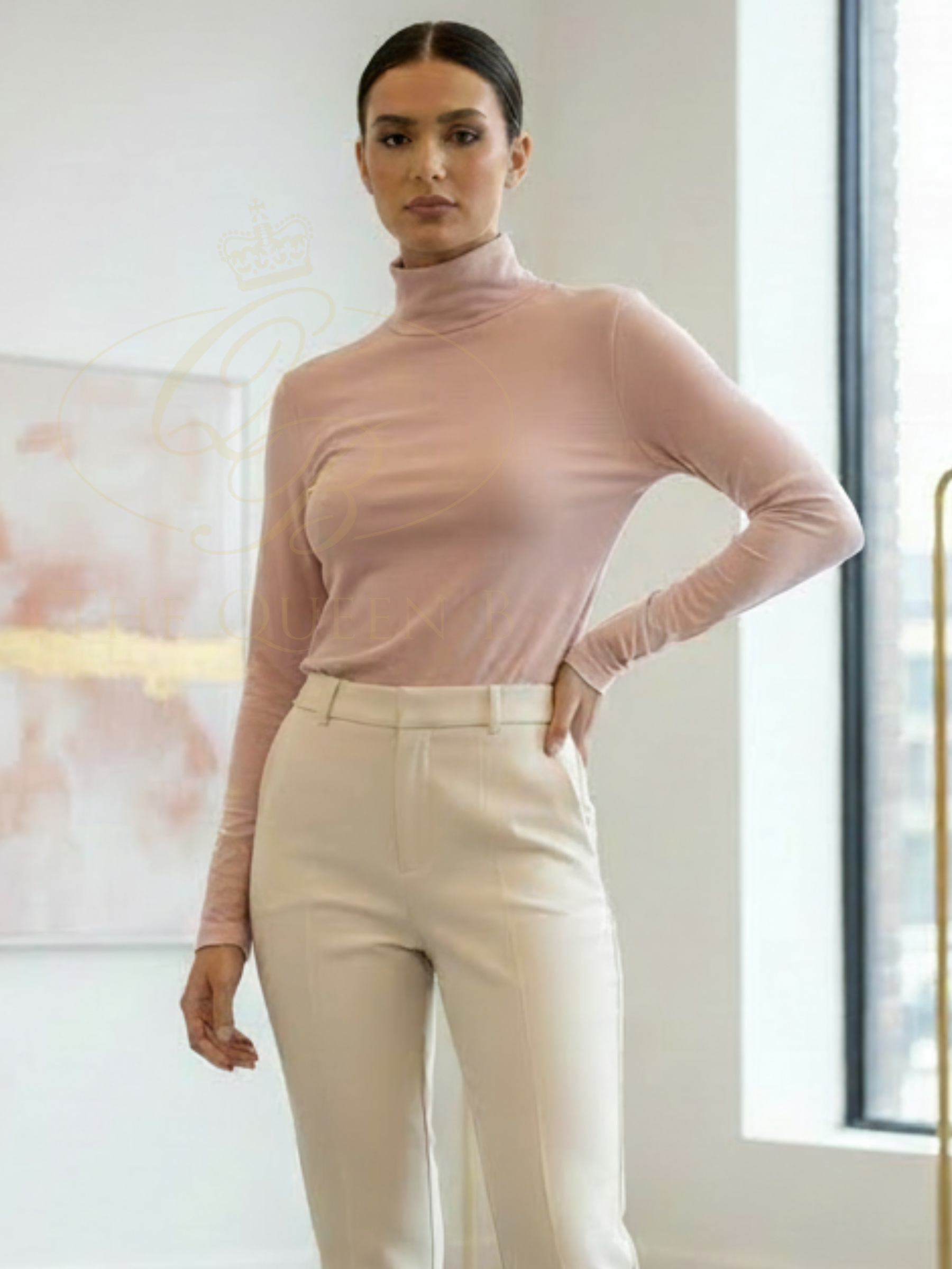 QBSS26 EV Shannon Tunnel Neck Long Sleeve Top with fleece-lined interior, tunnel neckline, stretch fabric and relaxed fit for everyday wear.