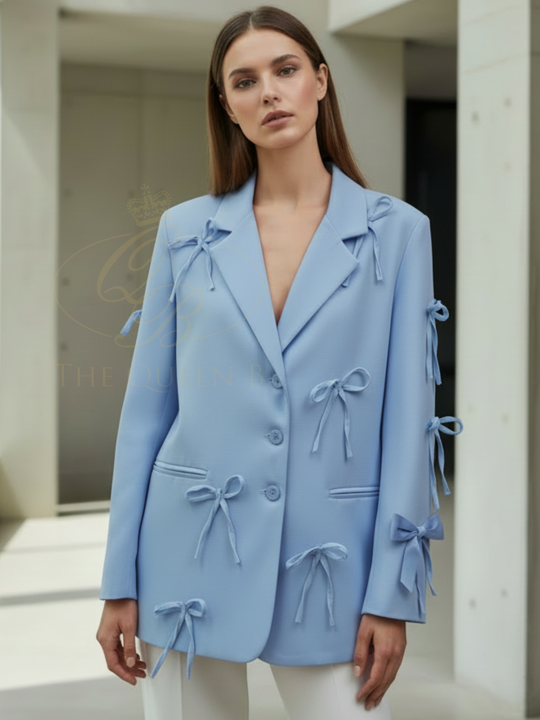 QBSS26 UA Jasmine Bow Blazer with tailored silhouette, bow detailing and classic lapel neckline, styled for an elegant finish.