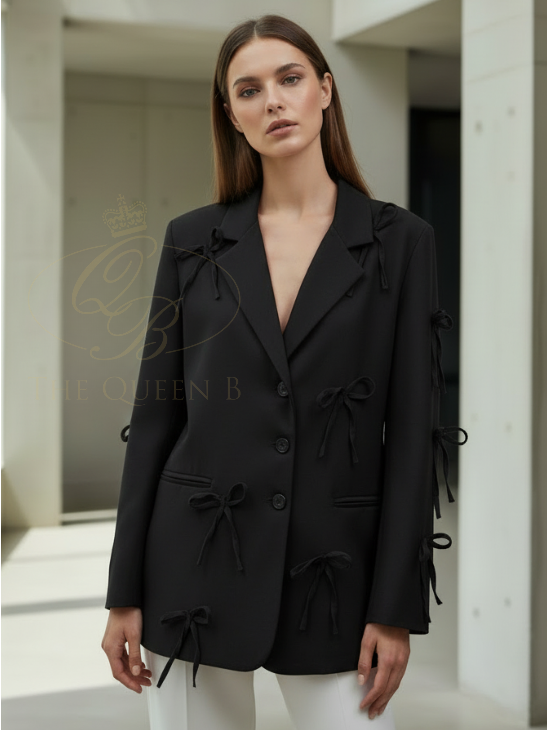 QBSS26 UA Jasmine Bow Blazer with tailored silhouette, bow detailing and classic lapel neckline, styled for an elegant finish.