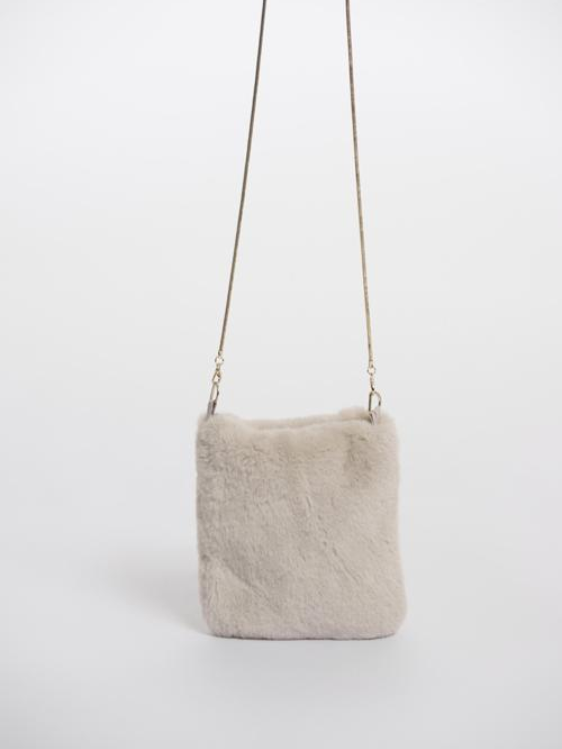 Women’s birch faux fur crossbody bag with slim chain strap – soft plush evening bag perfect for winter outfits and chic day-to-night styling.