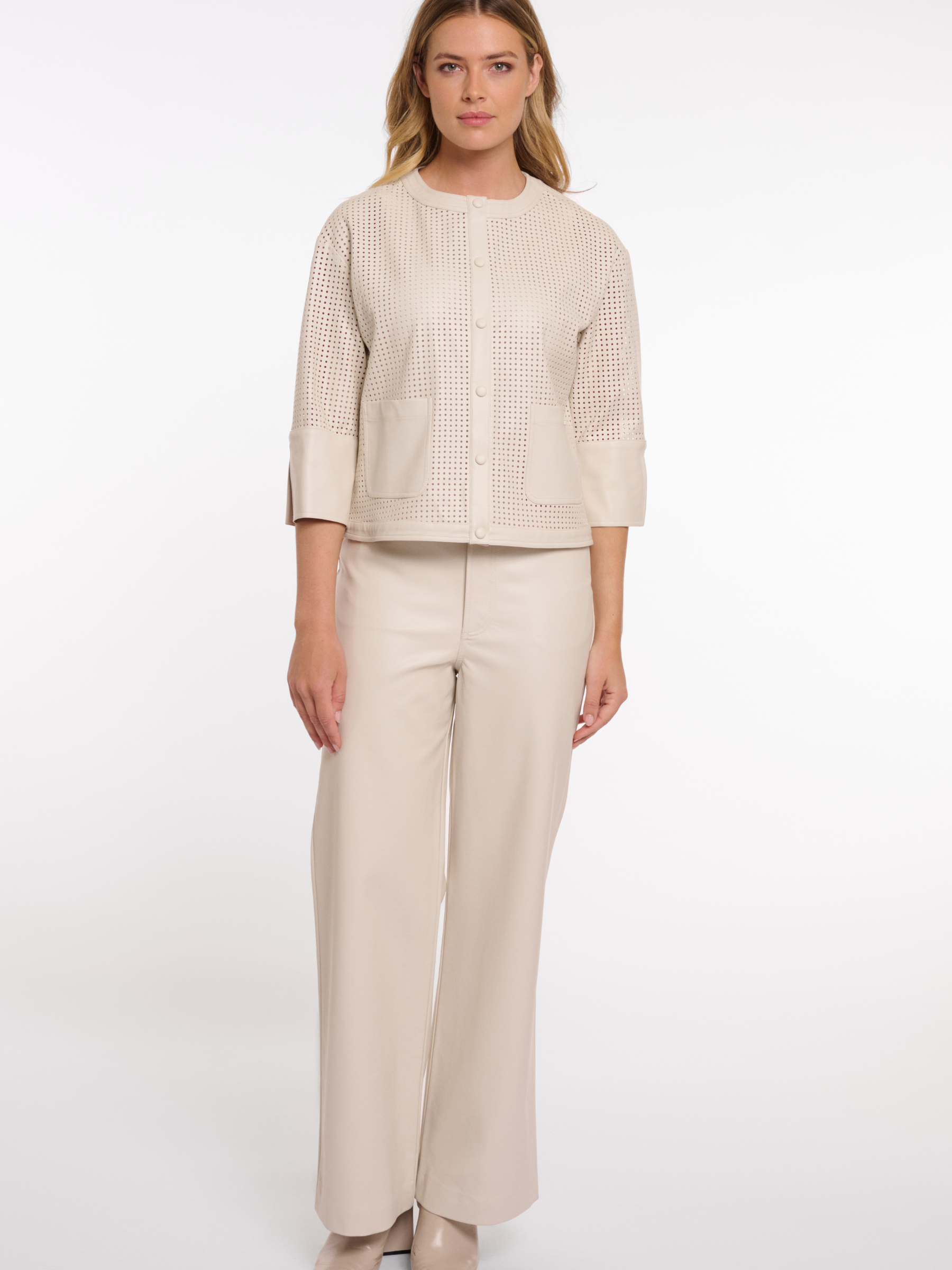 Rino & Pelle Abou Jacket with perforated faux leather design, cropped structured silhouette and modern button front.