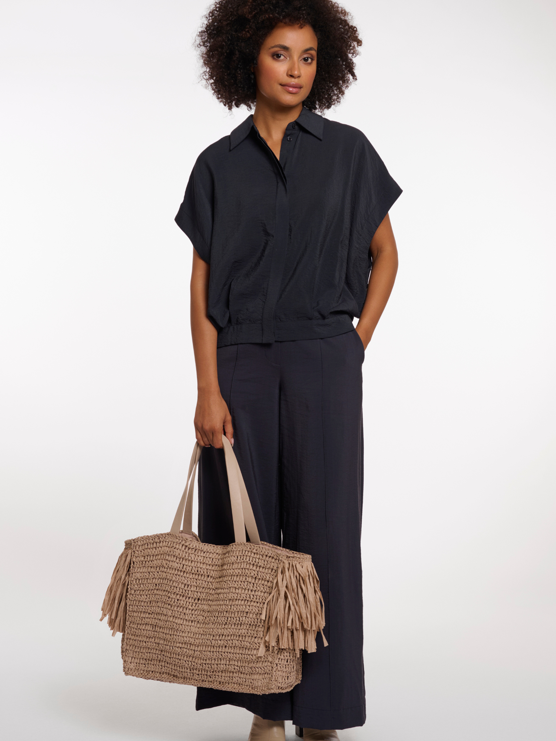Rino & Pelle Carlijn Beachbag woven tote bag with fringe trim and structured silhouette.