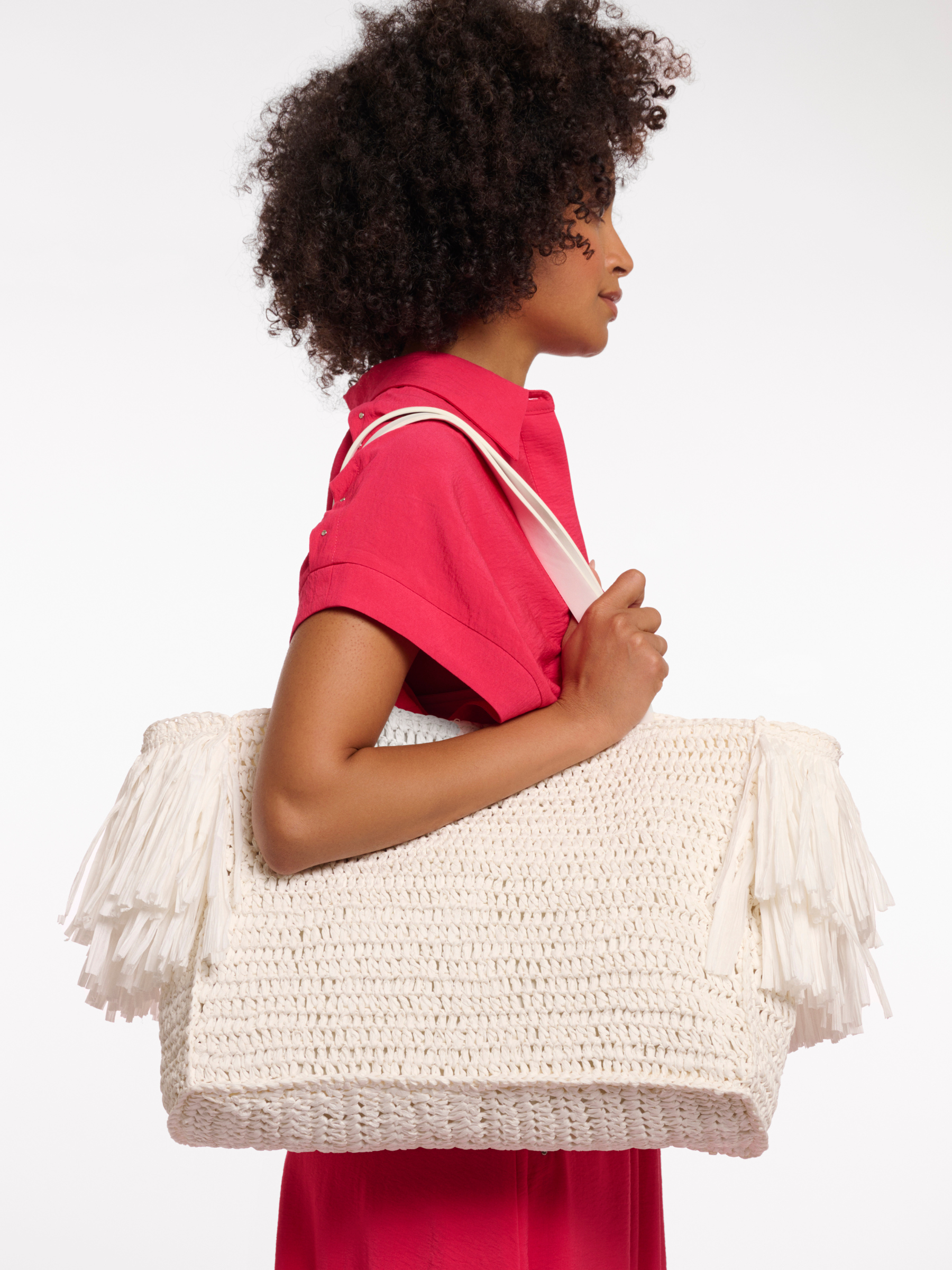 Rino & Pelle Carlijn Beachbag woven tote bag with fringe trim and structured silhouette.