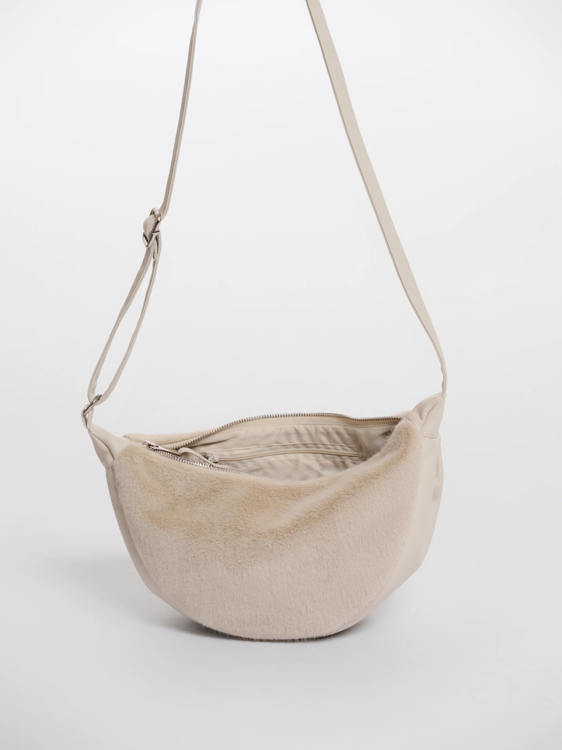 Rino & Pelle Dalina Birch Mini Crossbody Bag – women’s beige crossbody bag with adjustable strap, compact design and minimalist chic style for everyday wear.