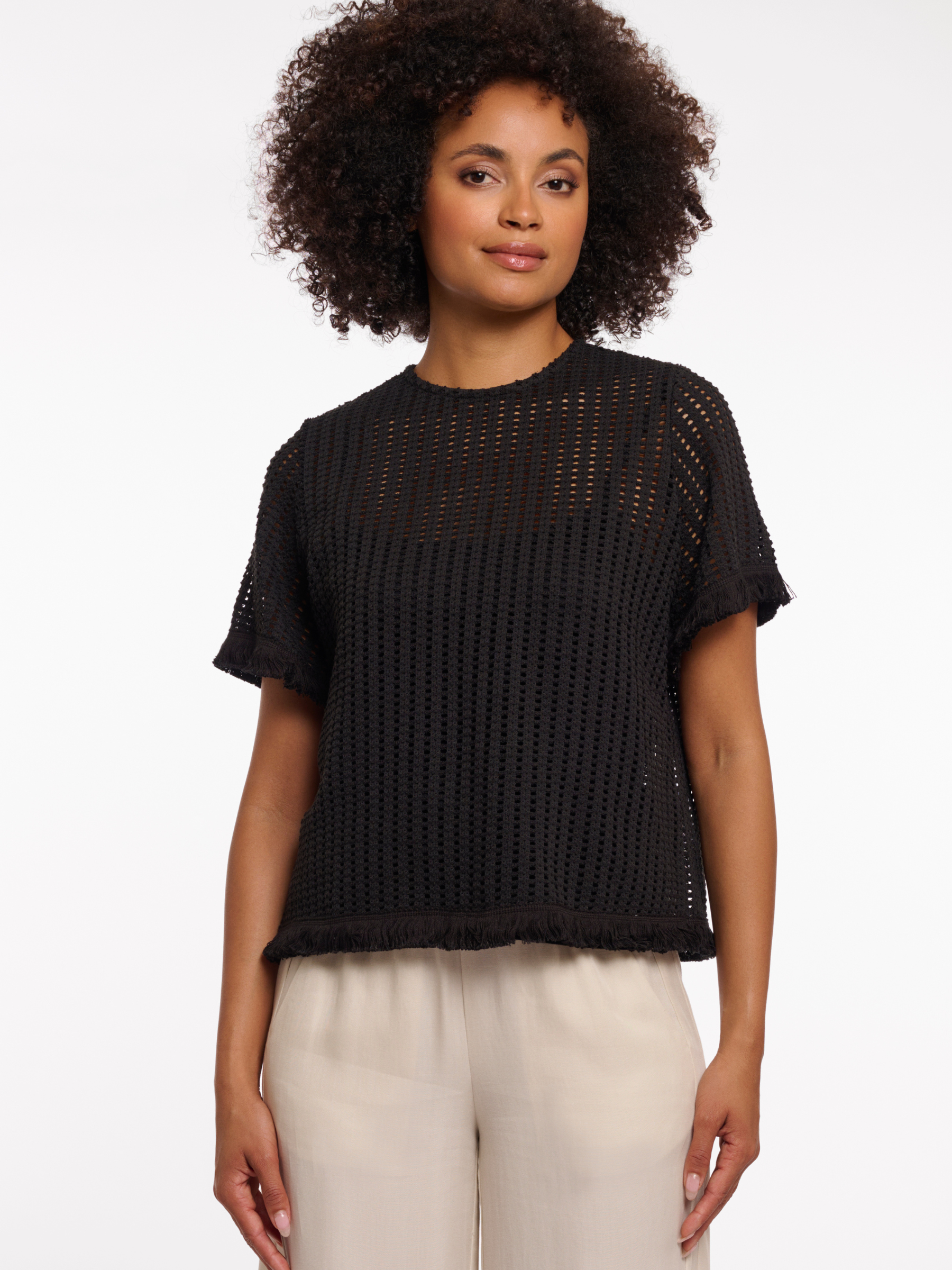 Rino & Pelle Flora Top open knit short sleeve top with fringe trim and round neckline.
