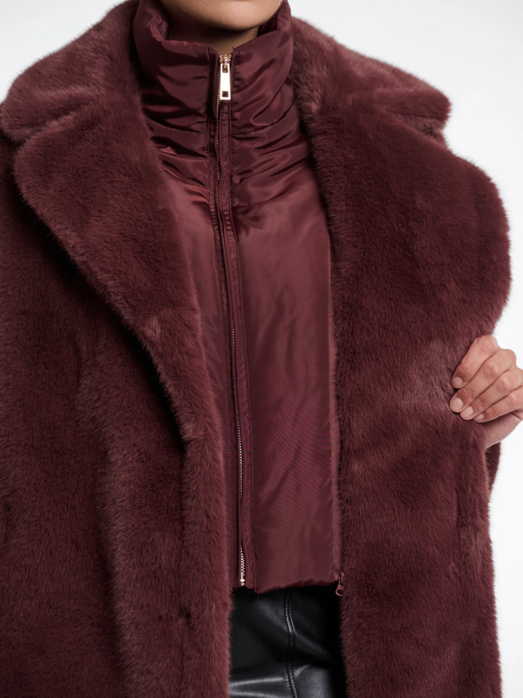Rino & Pelle Geesje Chocolate Bean faux fur coat with zip inner layer-luxury women’s longline winter coat for stylish cold-weather outfits.