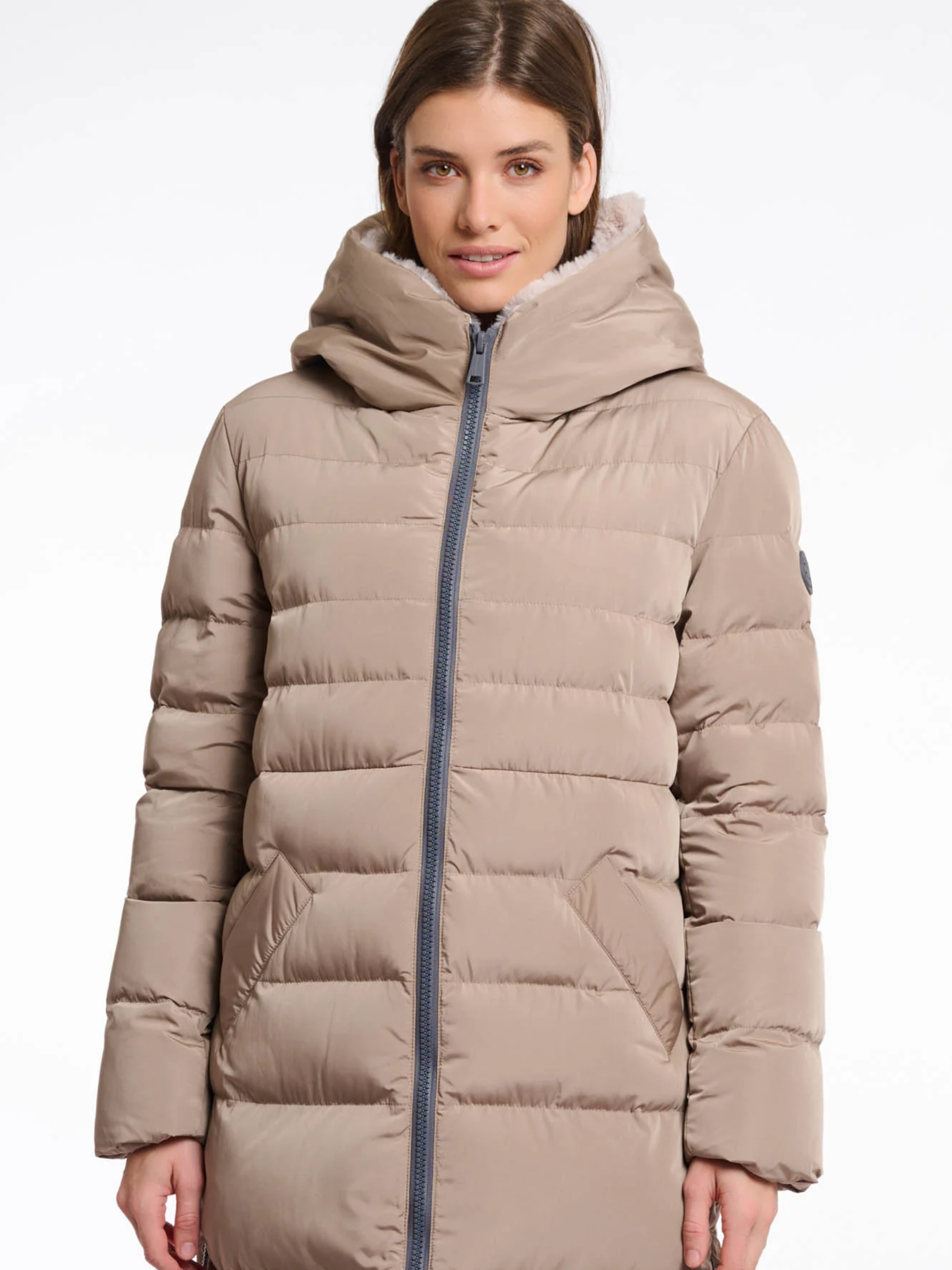 Rino & Pelle Keilafur long padded winter coat for women with faux-fur lining, hood, zip closure and side zips – stylish insulated outerwear for cold weather.