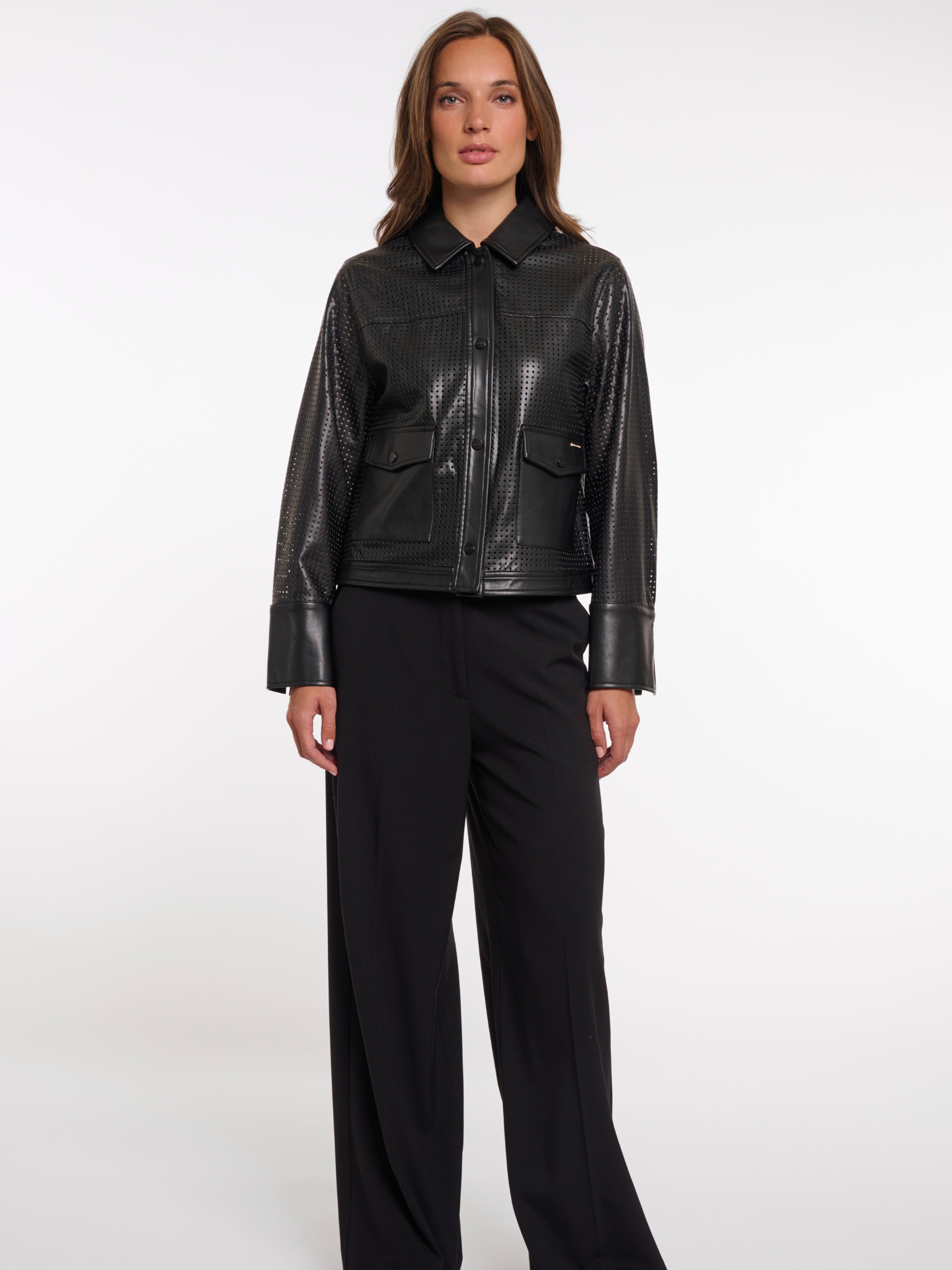 Rino & Pelle Nandi Jacket perforated faux leather button front jacket with patch pockets and structured collar.