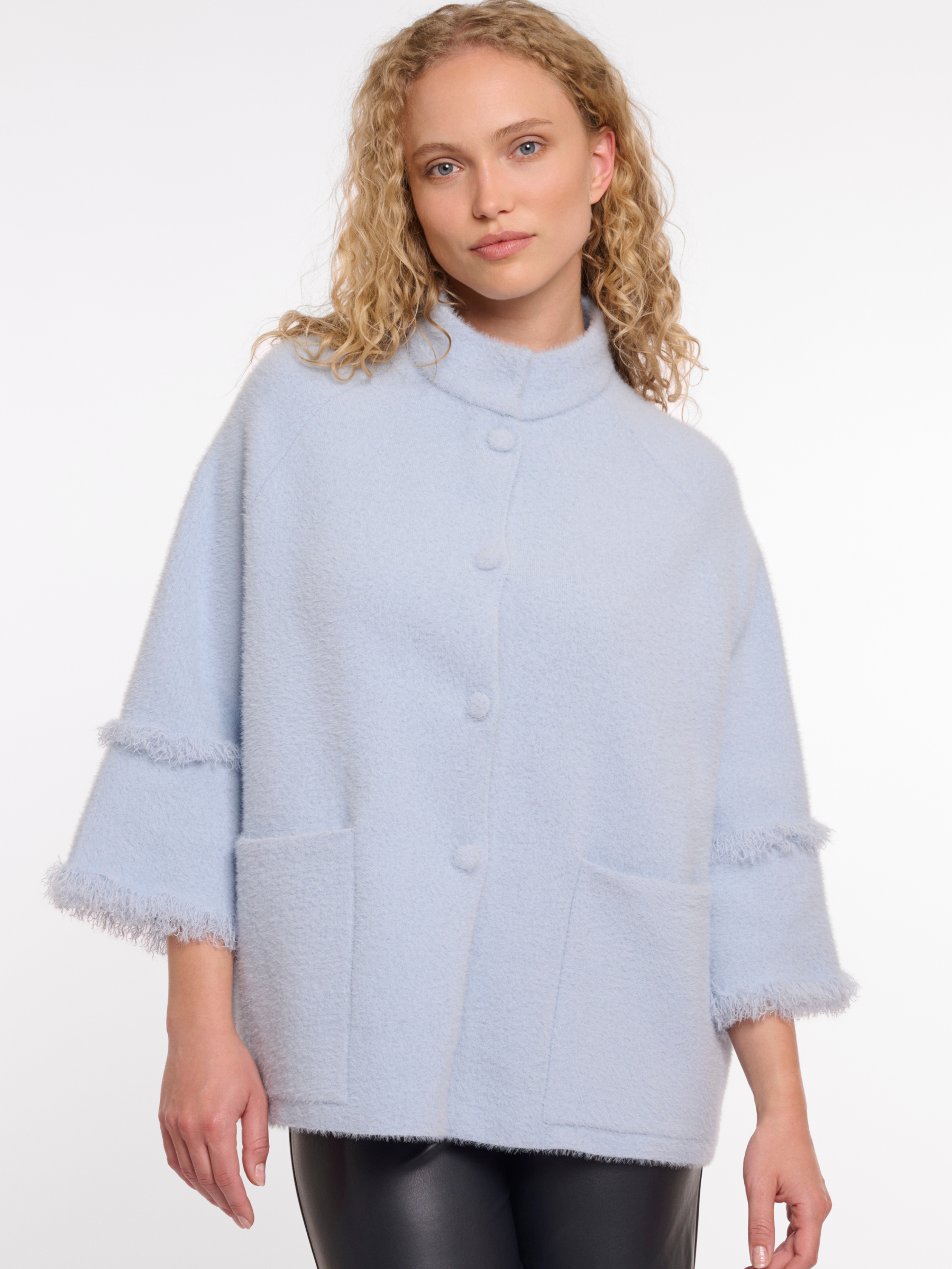 Rino & Pelle Sabe Cape soft textured oversized cape with button fastening and front patch pockets.