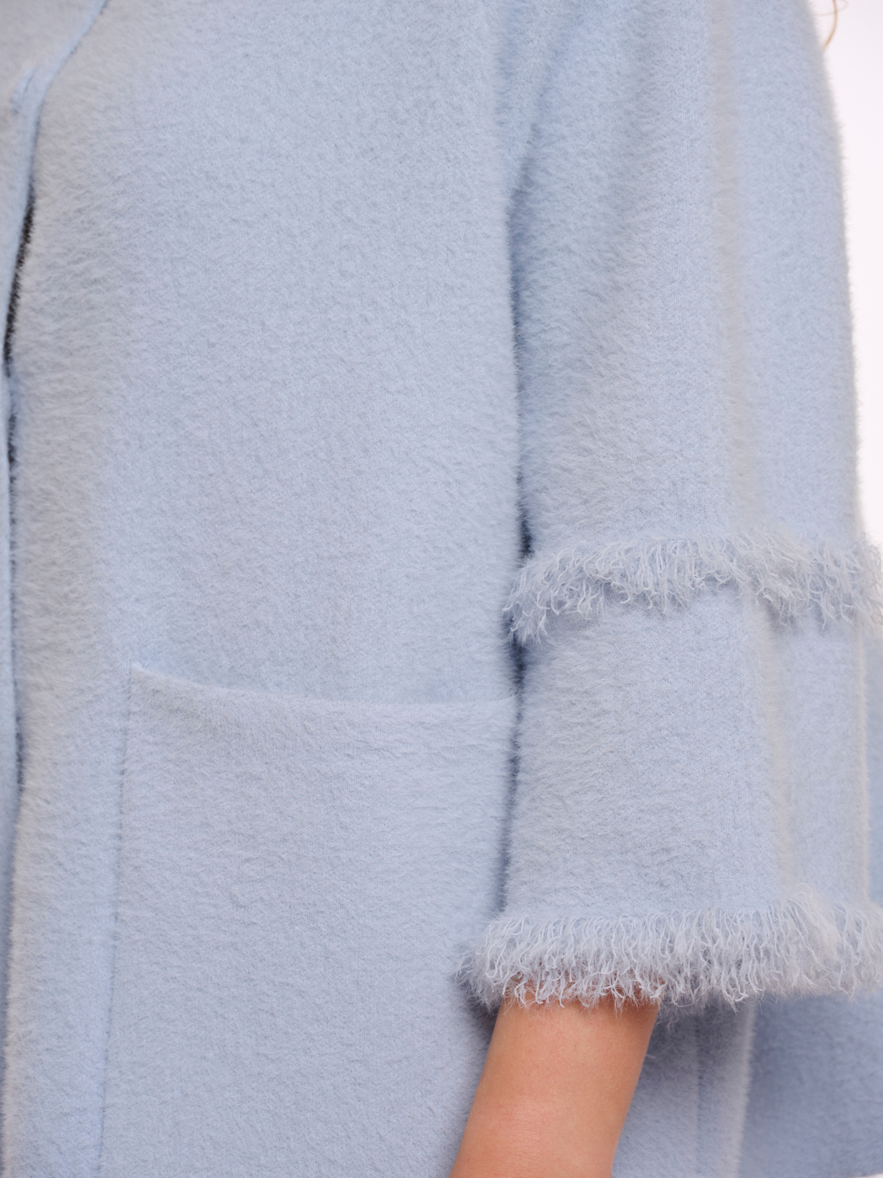 Rino & Pelle Sabe Cape soft textured oversized cape with button fastening and front patch pockets.