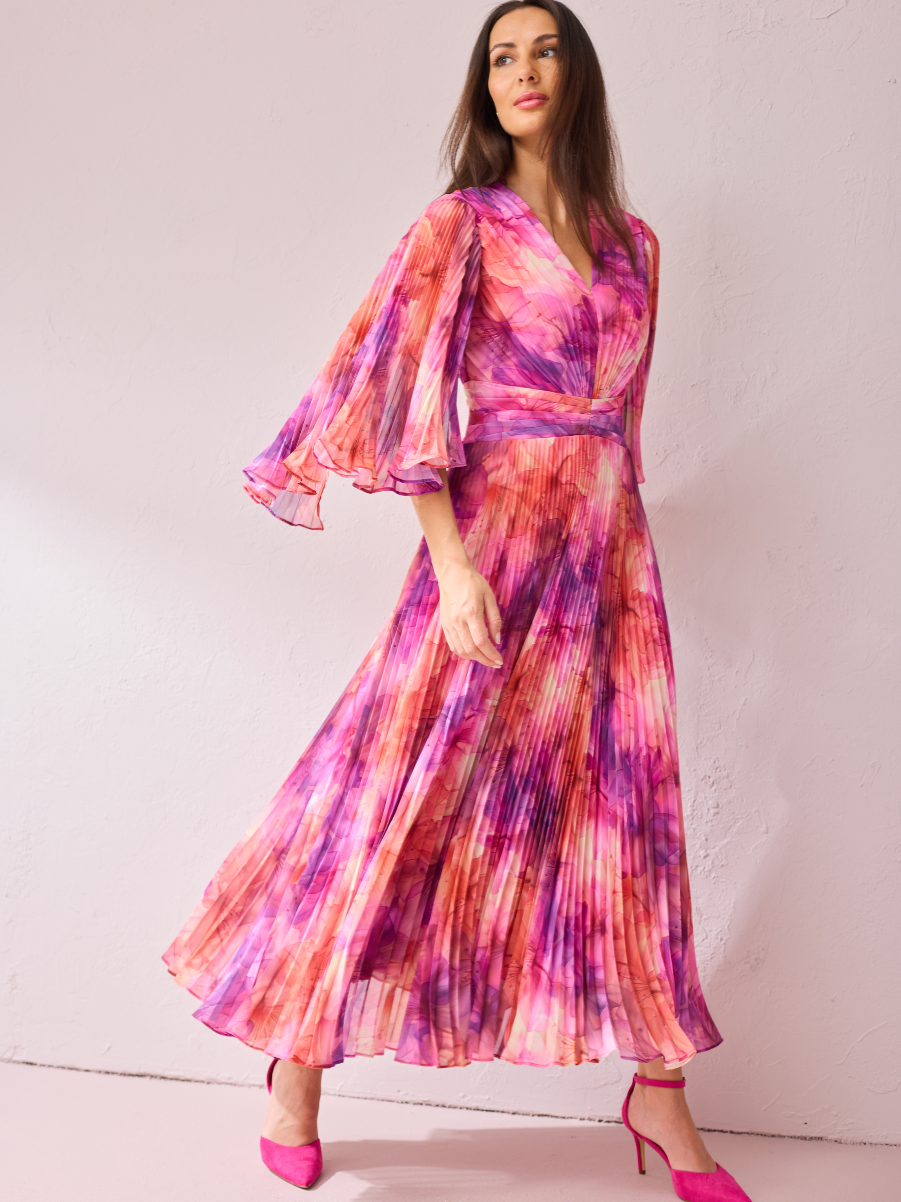 Samantha Jane Alice Pink Print Dress with pleated maxi skirt, wrap-style bodice and flowing silhouette.