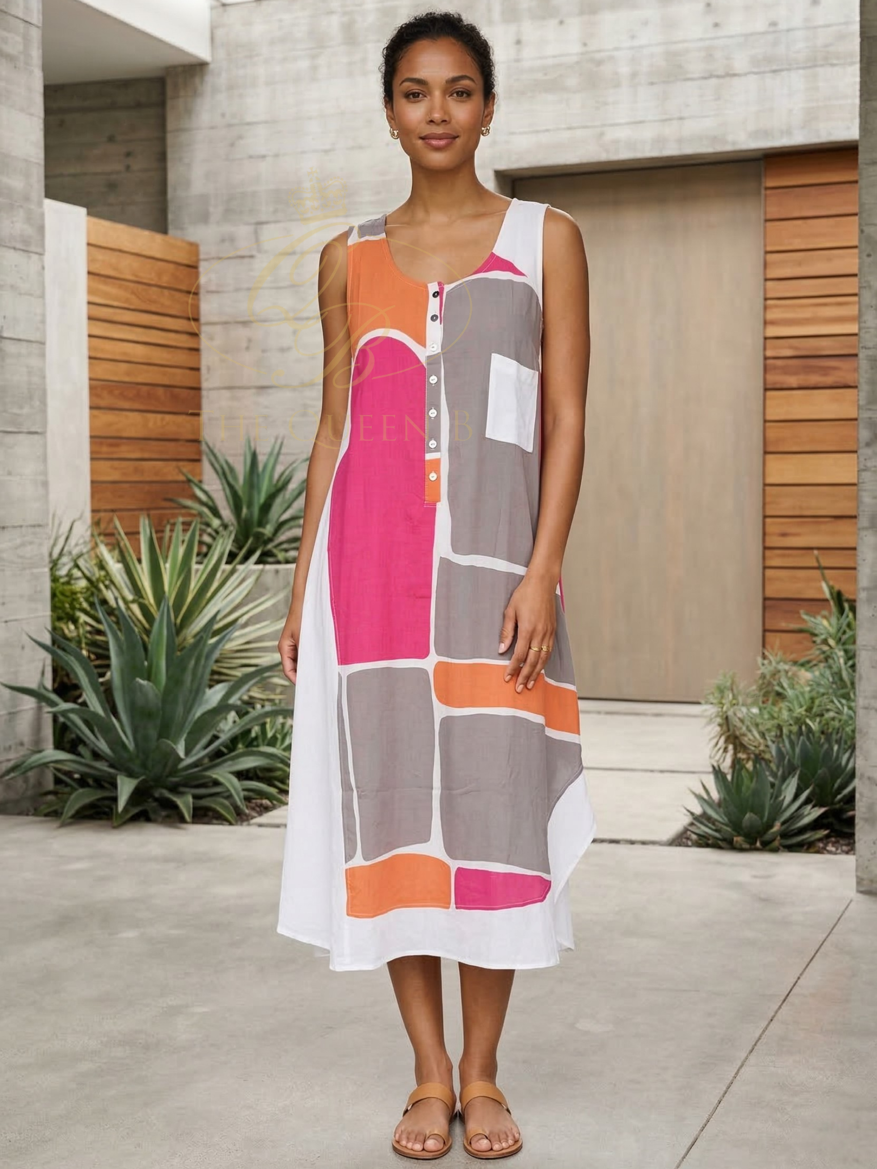Tara Vao Maora 9016 Dress with sleeveless relaxed silhouette, button placket neckline and colour block print.