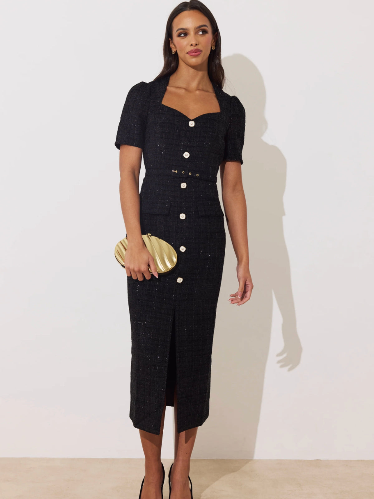 The 8th Sign Harriet Sparkle Tweed Midi Dress with sweetheart neckline, short sleeves, updated gold button-front detail, waist belt and front split.