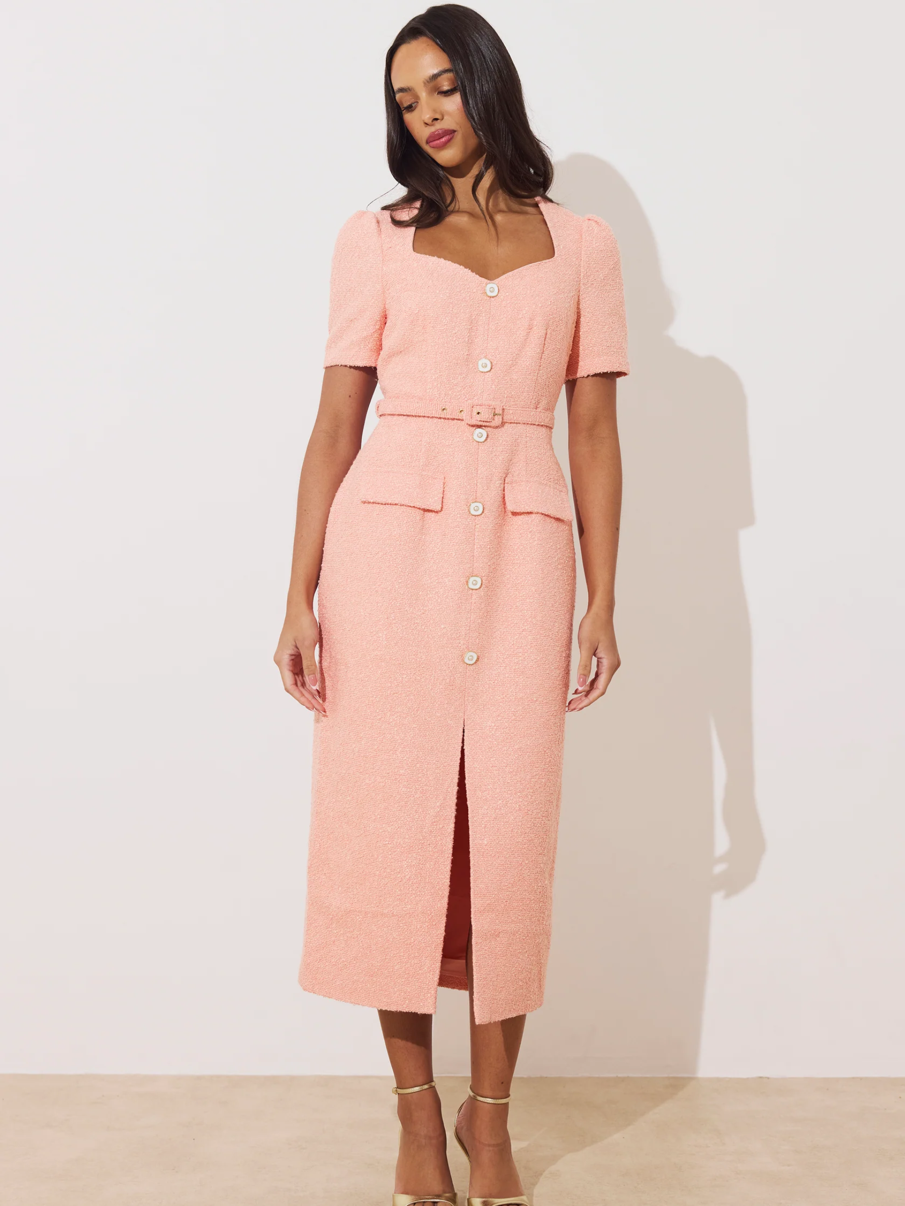 The 8th Sign Peach Harriet Tweed Belted Midi Dress women’s peach textured tweed midi dress with square neckline, short sleeves, button front and waist belt.