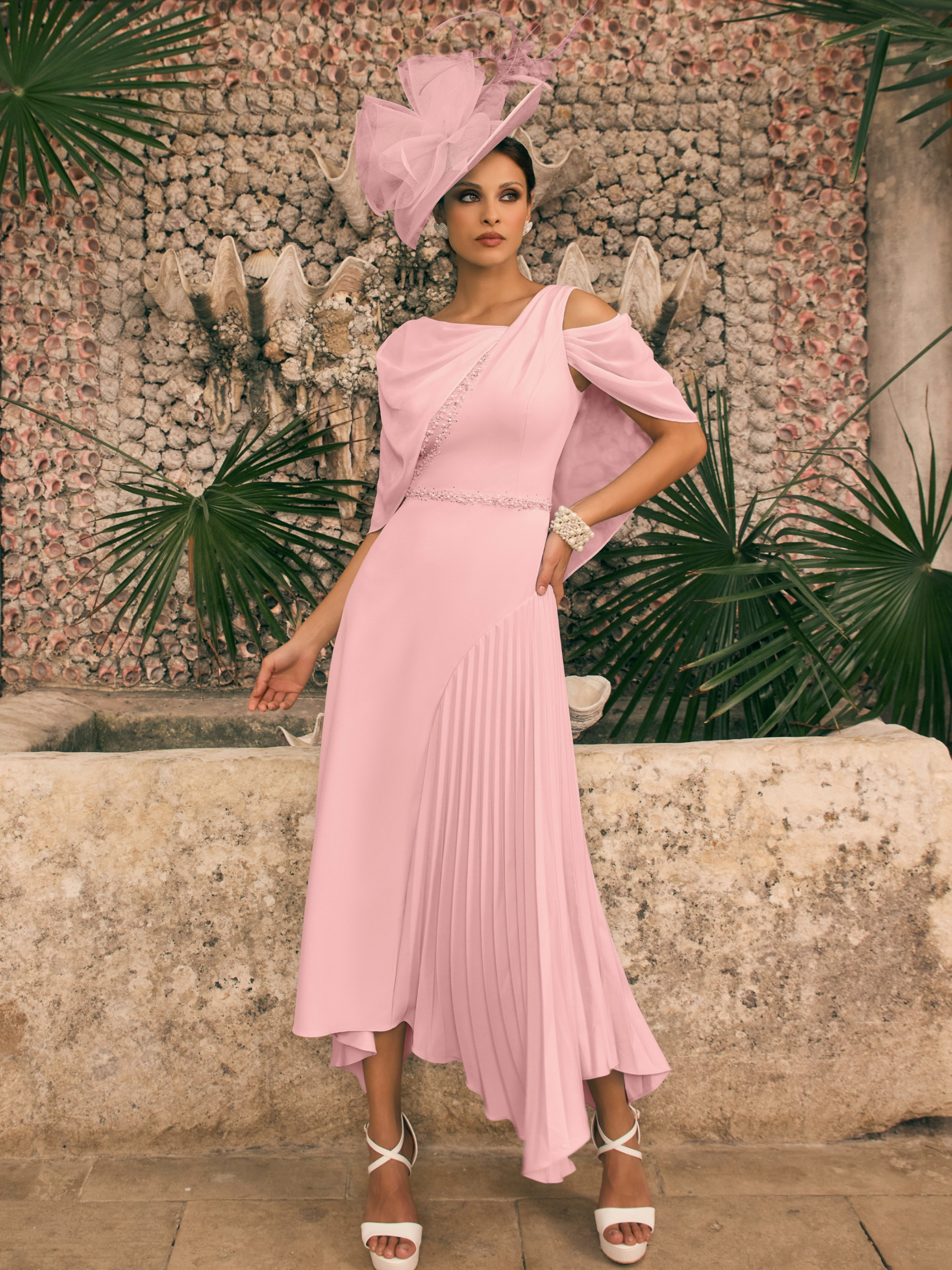 Veni Infantino 992785 Blush Dress with cape sleeves, pleated-to-straight skirt and beaded trim - elegant occasion
wear for weddings and formal events.