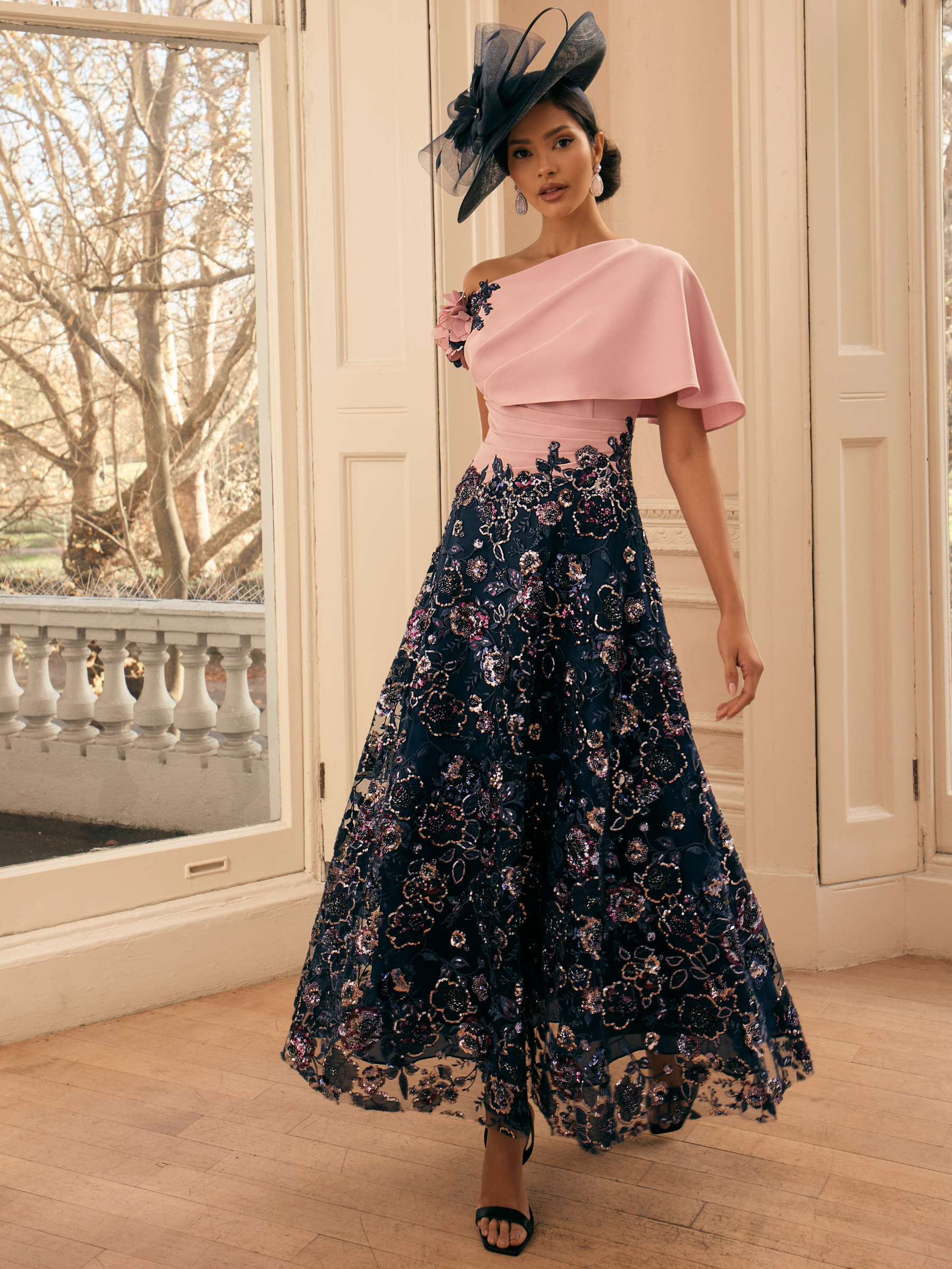 Veni Infantino 992813 Warm Rose / Navy Dress with asymmetric draped bodice, floral appliqué and embellished A-line skirt