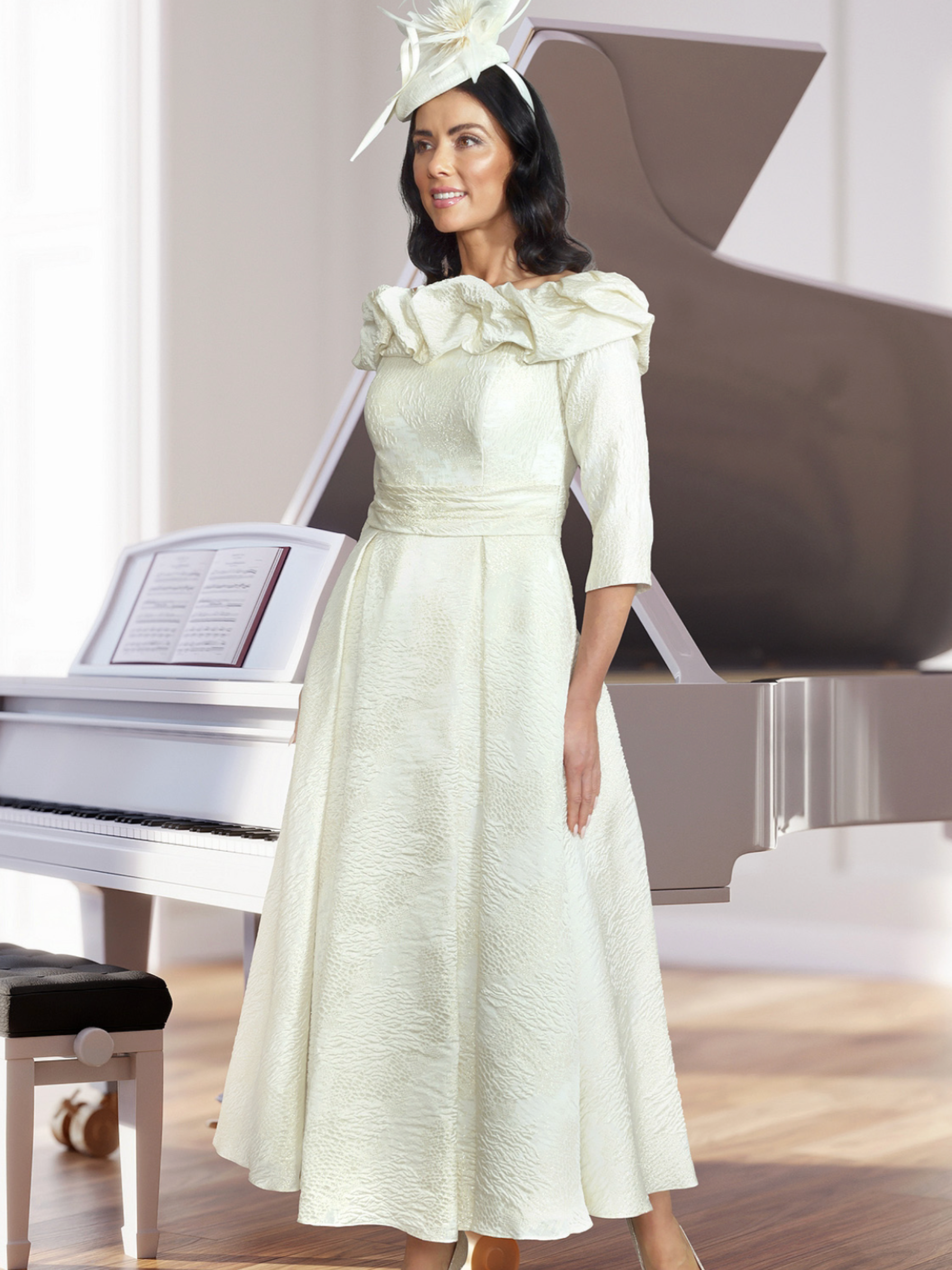 Veromia Occasions VO2911 cream and gold midi dress with ruffle neckline, three-quarter sleeves, defined waist and A-line skirt.