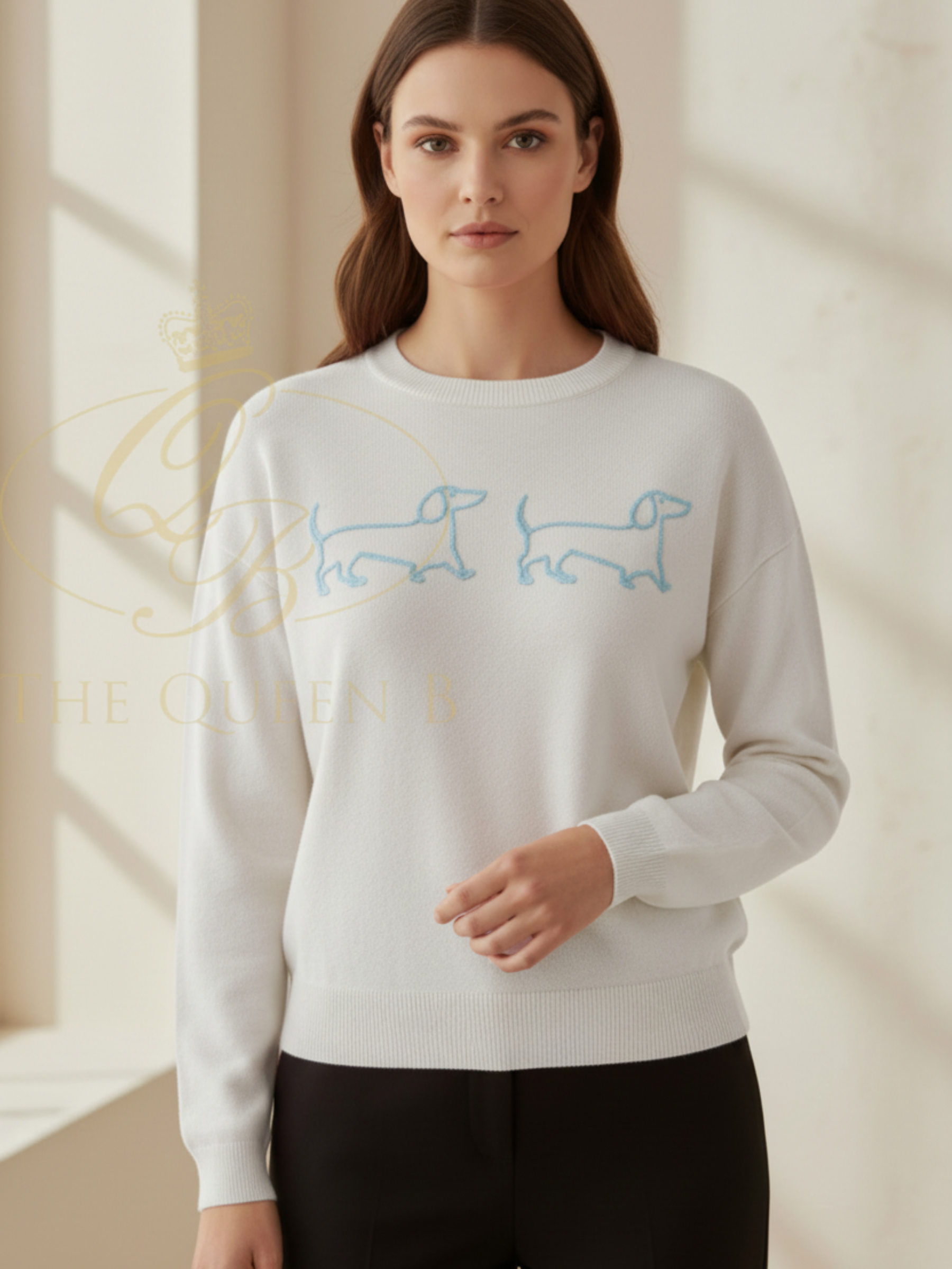 Alice Collins Jessie & Pippa knit pullover with embroidered dachshund motif and ribbed cuffs and hem.