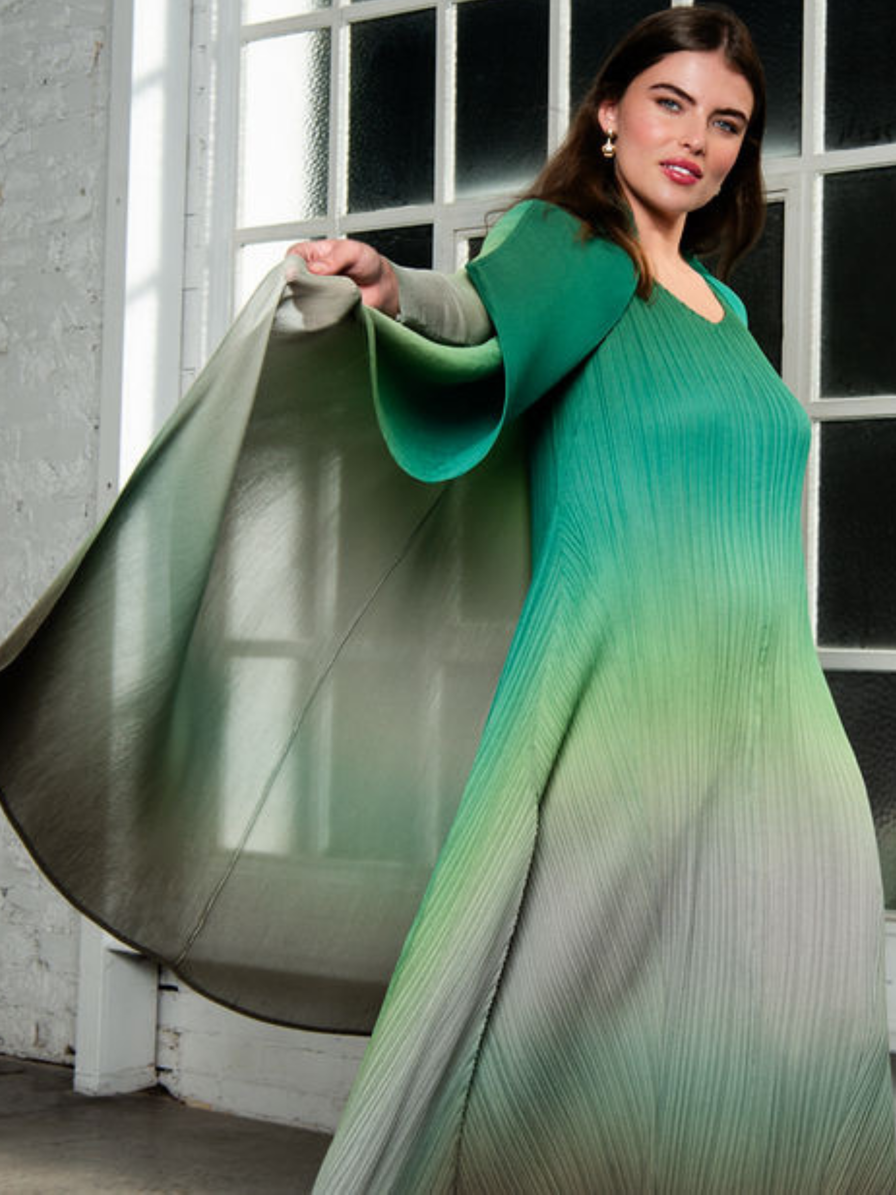 Alquema Green Tambourine Dress & Coat hand-pleated dress and coat set in rich green tones with fluid silhouette and open-front drape coat.