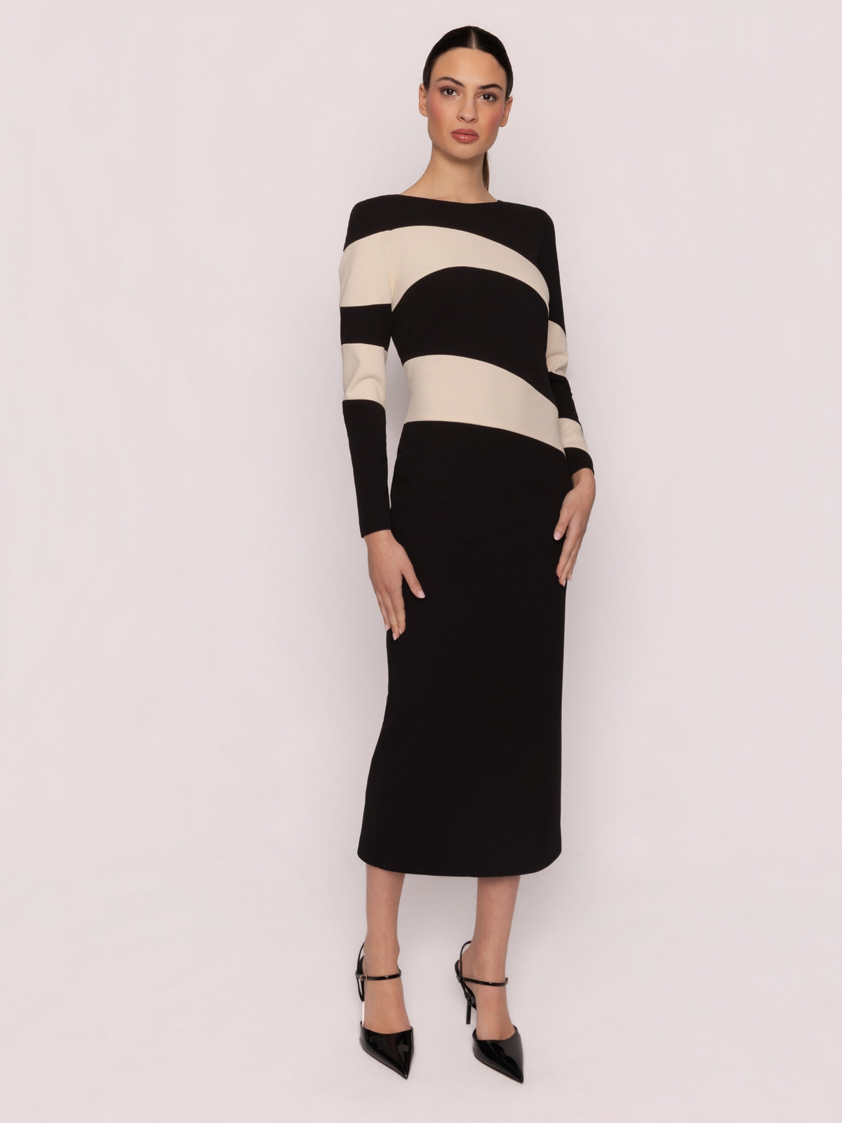 Arggido 21063 Bicolour Dress with contrast panel detailing, round neckline, long sleeves and fitted midi silhouette.
