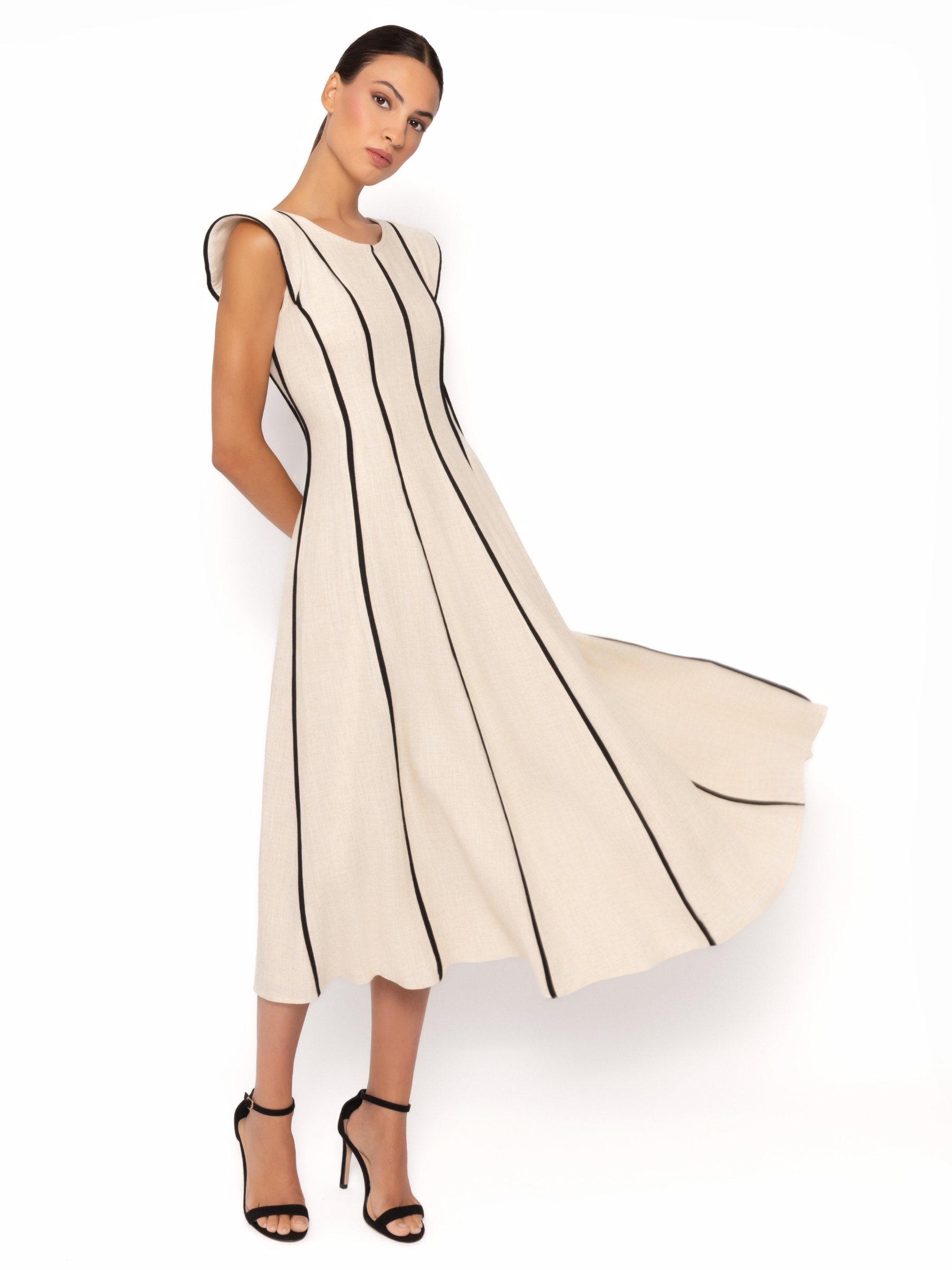 Arggido 49540 midi dress with structured panel detailing, cap sleeves and softly flared skirt.