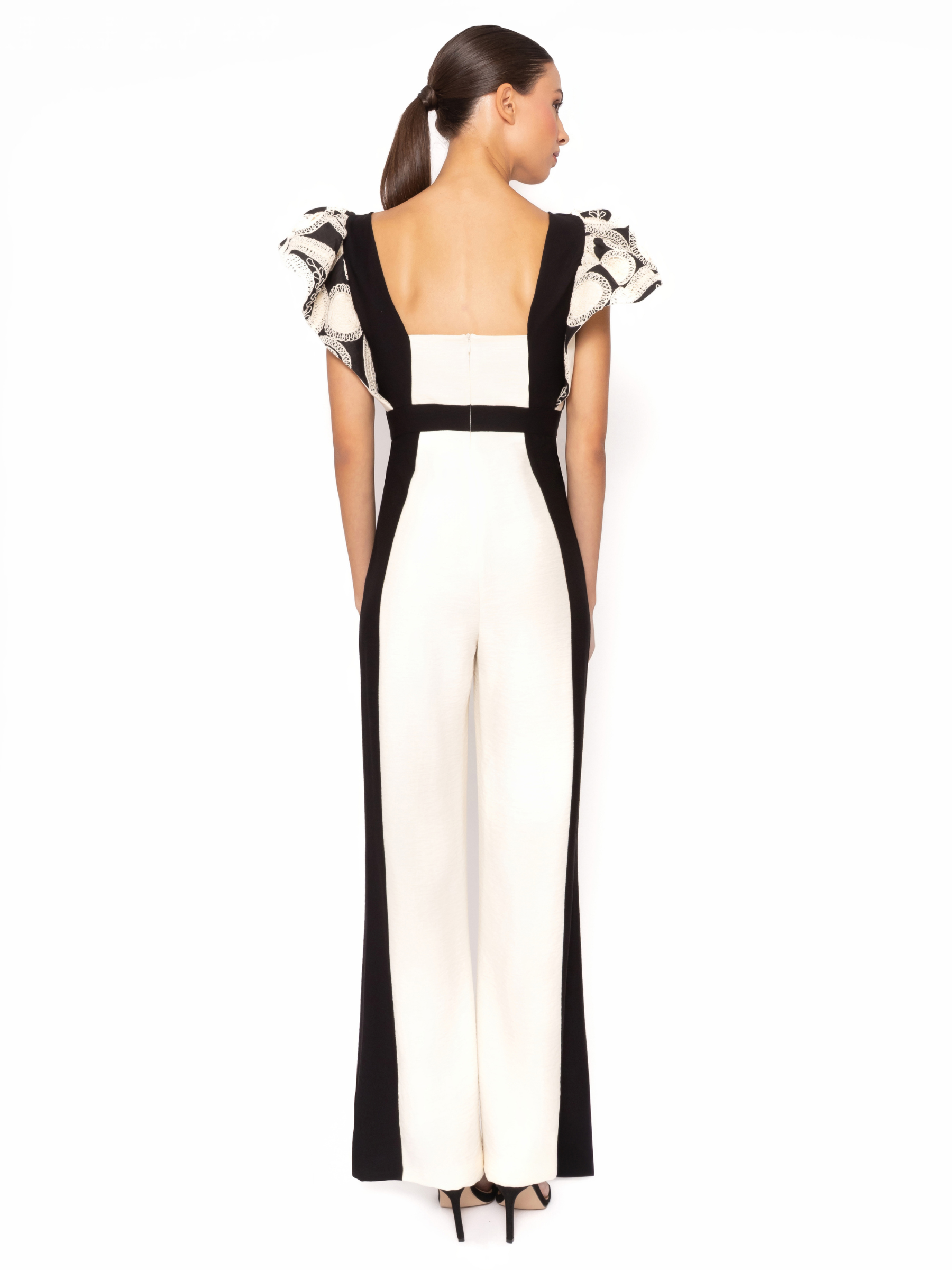 Arggido 49566 jumpsuit in monochrome with square neckline, frill sleeves and wide leg trousers.